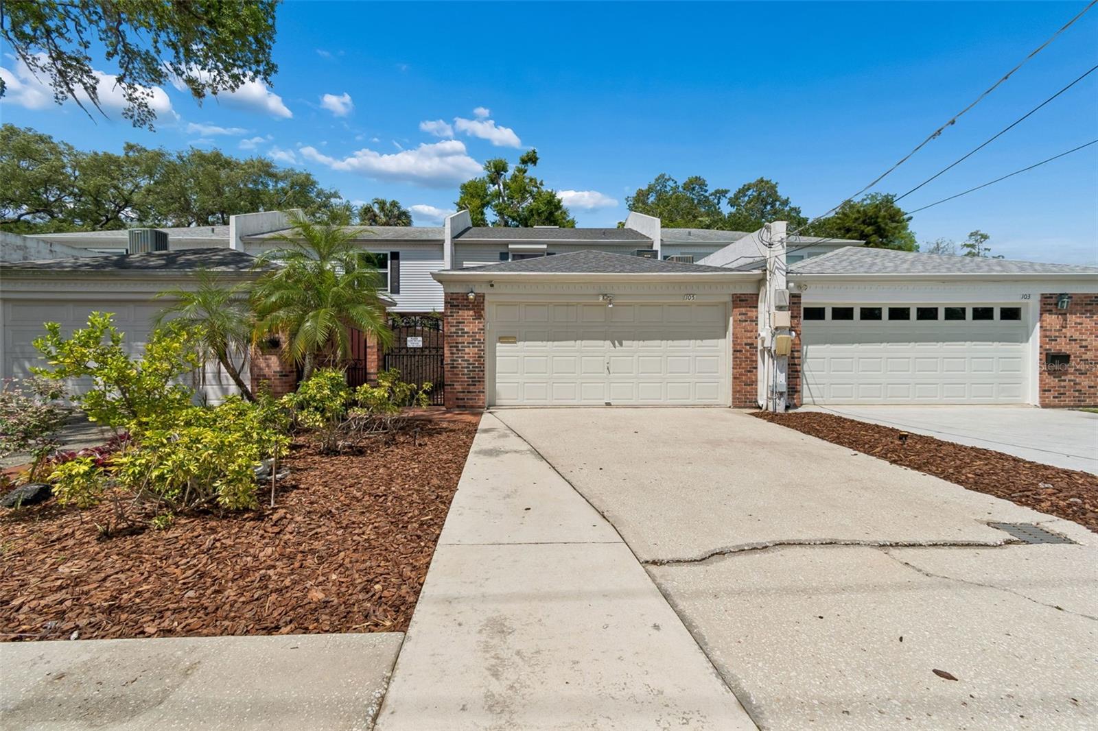 WOW! Welcome to Beach Park in South Tampa—an incredible opportunity to own a spacious townhome in one of the area’s most desirable locations. This well-appointed residence offers 3 bedrooms, 2.5 bathrooms, a 2-car garage, and a private backyard—features that are increasingly hard to find at this price point.The lifestyle here is truly unmatched. Step outside and enjoy the convenience of nearby everyday essentials and local favorites. Whether you're in the mood for a quick smoothie just steps away, a Cuban coffee a short bike ride down the street, or a quick grocery run less than half a mile from home, everything you need is within easy reach. You’re also just minutes from multiple shopping destinations, an abundance of dining options, Tampa International Airport, and perfectly positioned between the Westshore Business District and Downtown Tampa—making commuting and entertainment effortless.Inside, the home blends comfort with thoughtful upgrades. Hand-scraped wood flooring adds warmth and character throughout the main living areas. The kitchen is both stylish and functional, featuring white shaker cabinetry, quartz countertops, and a smart layout. Washer and dryer hookups are discreetly located at the end of the kitchen near the door to the garage—conveniently placed without interrupting the flow of the space.Enjoy Florida living at its best with a screened lanai that opens to an extended concrete patio—perfect for grilling and entertaining. The fully fenced backyard provides privacy and flexibility for pets, play, or relaxing outdoors.Major system updates offer peace of mind, including a roof (2021) and A/C (2020). Additional improvements include a refrigerator (2023), microwave (2021), range (2016), dishwasher (2014), and water heater (2010).Even more appealing—there is no HOA or CDD fee. The property is located in Flood Zone X500, meaning flood insurance is not required, and it remained high and dry during the 2024 hurricane season.Zoned for highly sought-after public schools—Grady Elementary, Coleman Middle, and Plant High—this home checks every box for location, livability, and long-term value.