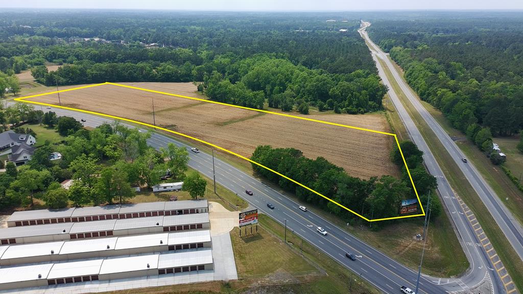 12 Acres Zoned Commercial General (Many Options and Possibilities), Sewer and Water Available. (Contact City for Letter of Availability.) Diveway Access Available on Hwy 319 and the By-Pass(Rights Reserved). Good, level, high ground, cleared(field).  Located .5+ miles NE of Walmart.  Excellent Traffic and Good Viz.  Excellent Soils.  CUVA  Program.  Farm Lease Income, Sign Income.  New Survey.    Sign and Farm Lease are both year to year.  Consider growth path for Thomasville.   Hwy 319 North is on that path. Study Thomas County Zoning Map. Great tract to anchor and parcel out.
