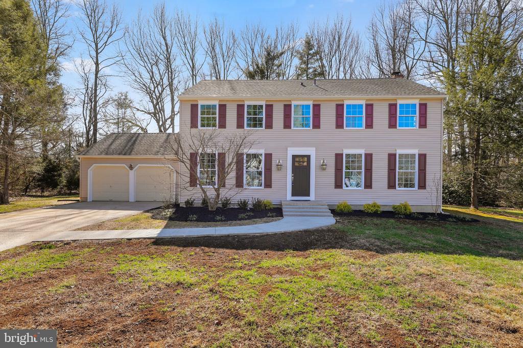 Welcome to this beautifully renovated two-story home tucked away on a quiet cul-de-sac in one of Medford’s most sought-after neighborhoods. Featuring 4 spacious bedrooms, 2 full bathrooms, and 1 half bath, this move-in-ready residence blends modern updates with timeless comfort.From the moment you arrive, you’ll appreciate the new front and back entry doors and the attention to detail carried throughout the fully painted interior. Inside, the main level boasts stylish and durable LVP flooring, recessed lighting, updated electrical switches and receptacles, and brand-new interior doors that elevate the home’s clean, contemporary feel.The remodeled large living room is a standout feature, highlighted by a stunning new stone veneer fireplace and custom mantel—creating the perfect focal point for gatherings and cozy evenings at home.The kitchen has been thoughtfully refreshed with quartz countertops, a new sink, a new dishwasher, and beautifully painted cabinets, offering both functionality and modern appeal.Upstairs, you’ll find plush new carpeting throughout the second floor and four generously sized bedrooms with updated closets that provide improved organization and storage. All three bathrooms—including two full baths and one half bath—have been fully renovated with tasteful finishes and fixtures.Additional upgrades include new garage door openers, new attic stairs for easy storage access, and crawlspace insulation for added energy efficiency.Located in a fantastic Medford neighborhood known for its charm and community atmosphere, this turnkey home offers the perfect blend of style, comfort, and convenience. Schedule your private showing today!
