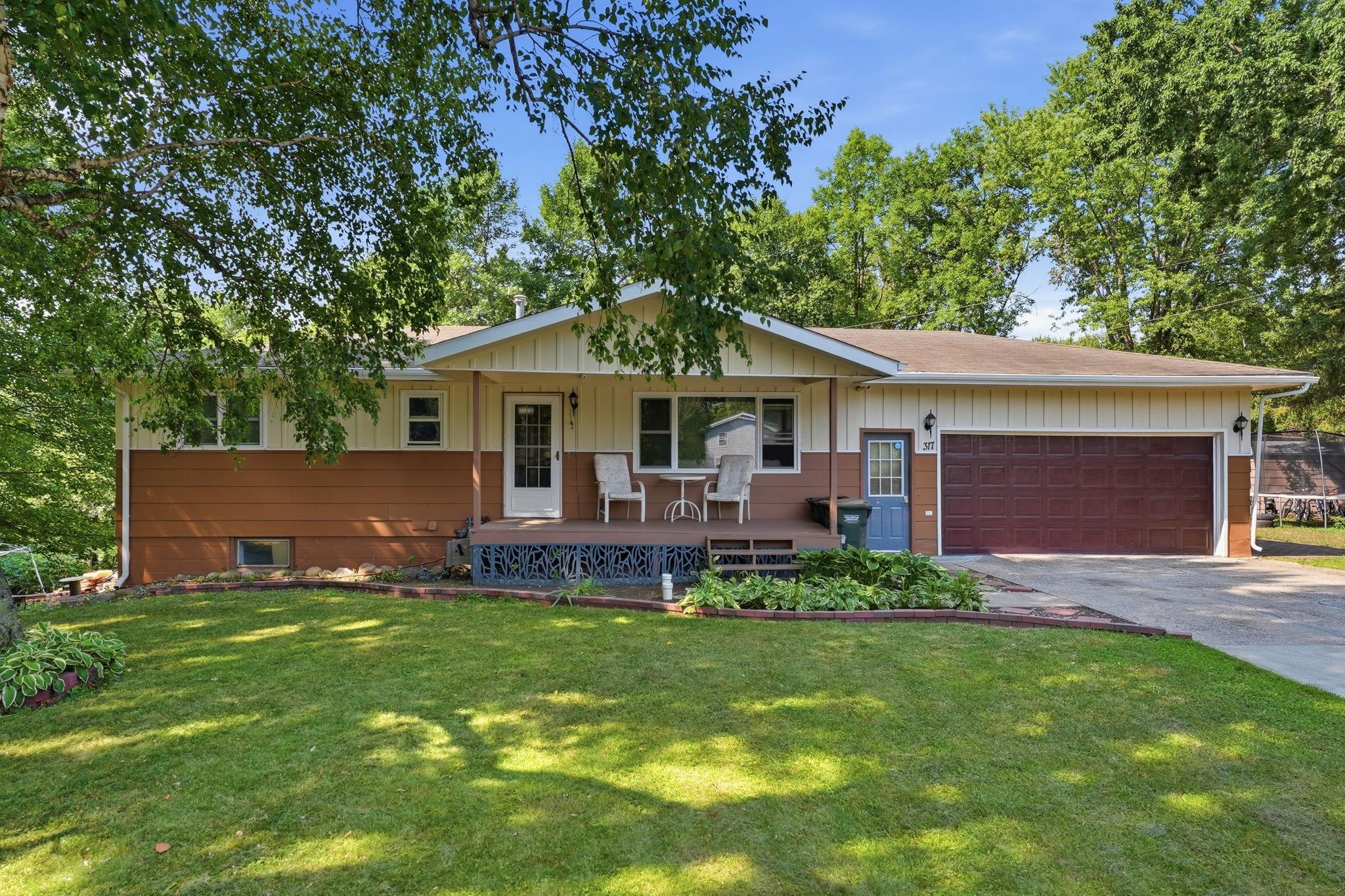 Welcome to 317 9th Ave S in Cold Spring! This move-in ready rambler offers a great location and plenty of space inside and out. The main level features a bright living room, a spacious kitchen and dining area, and comfortable bedrooms, including a private bathroom in the primary suite. The finished lower level provides additional living space and walks out to a large patio and private backyard with mature trees, perfect for relaxing or entertaining. An attached, heated and insulated 2-stall garage adds even more convenience. Located in the ROCORI School District near the Chain of Lakes, golf courses, schools, restaurants, parks, and other local amenities. Come see everything this Cold Spring home has to offer!