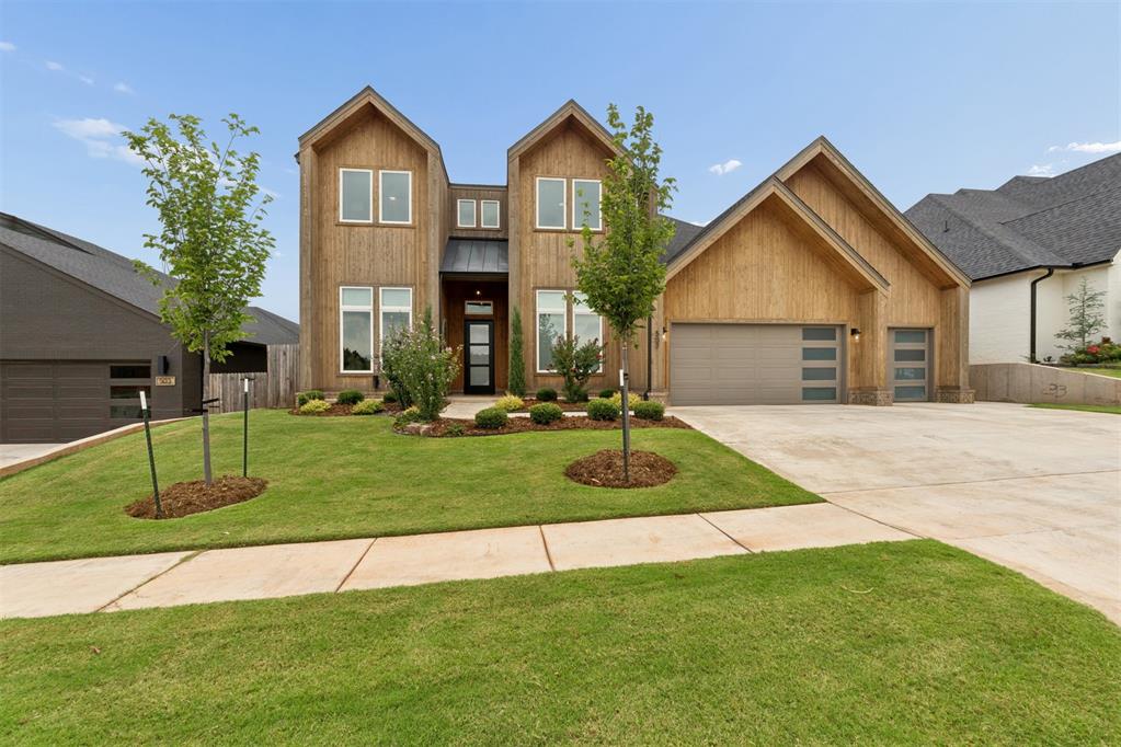 Step into this beautifully designed home featuring an exceptional open floor plan with a stunning vaulted-ceiling living room that flows seamlessly into the gourmet kitchen offering a great space that is perfect for both everyday living and entertaining. The kitchen is complemented by an incredible butler's pantry, fully equipped with abundant cabinetry, expansive counter space, a prep sink, and dedicated space for small appliances, making organization and meal preparation effortless. The oversized primary suite offers a true private retreat with a luxurious en-suite bath featuring a relaxing soaking tub, spacious shower, and an impressive closet that conveniently connects directly to the laundry room. The main level also includes a private home office, along with a versatile formal dining room that can easily serve as a sitting room, music room, or additional flex space to fit your lifestyle. Upstairs, you'll find two generously sized bedrooms with large closets, a shared full bathroom, and an enormous theater/bonus room that's perfect for movie nights, game days, or a playroom. A massive closet off of the theatre room provides exceptional storage or the opportunity for a hobby or craft space. The three-car garage is equally impressive, offering generous additional storage space with plenty of room for a golf cart, workshop, home gym, or hobby area.Thoughtfully designed with generous living spaces, abundant storage, and flexible rooms throughout, this home combines everyday comfort with elegant style in every detail.