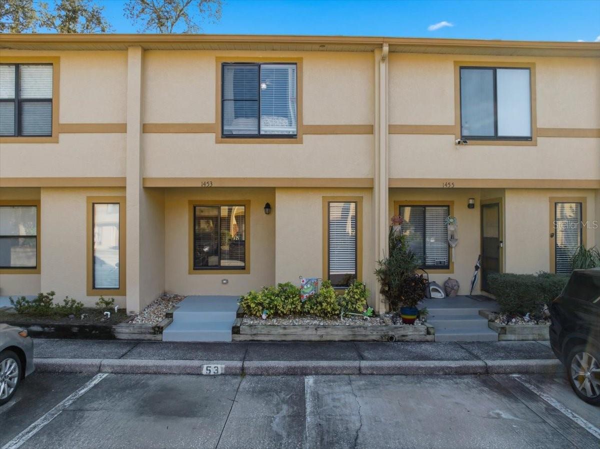 Welcome to this thoughtfully UPDATED two-story townhome in Central Brandon, where comfort, convenience, and low-maintenance living come together. The main level offers a bright, open living space with NEUTRAL FINISHES AND DURABLE FLOORING, creating a warm and inviting atmosphere. The UPDATED KITCHEN features crisp white cabinetry, stainless steel appliances, generous counter space, and a breakfast bar perfect for casual meals or morning coffee, while a DEDICATED DINING AREA provides additional space for everyday living or entertaining. The family room is filled with natural light and opens to a SCREENED-IN PORCH, leading to a PRIVATE, FULLY FENCED BACKYARD WITH TURF—a low-maintenance outdoor space ideal for pets, relaxing, or hosting friends. Upstairs, the SPACIOUS PRIMARY BEDROOM offers a peaceful retreat with soft carpeting, ample closet space, and an UPDATED EN-SUITE BATHROOM, while the SECONDARY BEDROOM is also generously sized with excellent closet space, perfect for guests or a home office. Additional highlights include UPDATED BATHROOMS, CEILING FANS THROUGHOUT, and a PRIVATE SCREENED BALCONY ideal for enjoying fresh air. The community features a RESORT-STYLE POOL AND GUEST PARKING, and the central location provides EASY ACCESS TO MAJOR HIGHWAYS, SHOPPING, AND DINING, all just minutes away and approximately 20 MINUTES TO DOWNTOWN Tampa. Home is CLEAN, UPDATED, and TURNKEY!