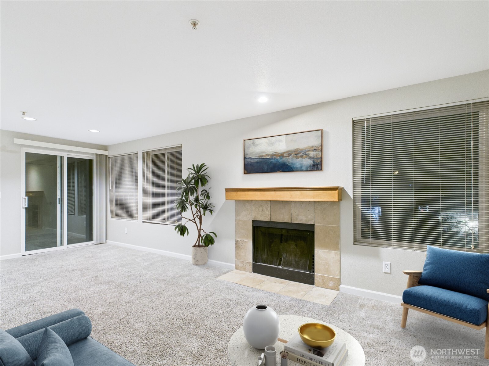 Welcome home to this desirable 3-bedroom end-unit condo, quietly tucked in the back of the community away from traffic and filled with natural light. Enjoy easy one-level living with a smart, open flow featuring a cozy wood-burning fireplace, energy-efficient double-pane vinyl windows, and a spacious layout with a dedicated dining area—perfect for meals, entertaining, or a flexible work-from-home space. Step outside to the covered private deck that extends your living space outdoors. Located in the well-maintained Aspen Grove community, residents enjoy top-notch amenities including an outdoor pool, clubhouse, fitness center, game/recreation room, playground, and no rental cap! Just minutes to Target, Trader Joe’s, Costco, Home Depot, and Lake Meridian Park, with quick access to Hwy 167, I-5, Hwy 18, and 515/516—this is comfort and convenience in one of Kent’s most sought-after locations.