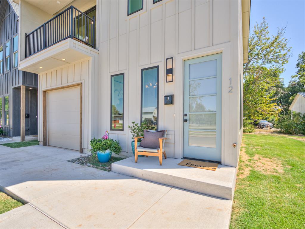 Parkside Perfection next to Downtown Edmond.

This stylish 3-bedroom, 2.5-bath home offers the best of both worlds - a community feel with downtown excitement. Positioned directly across from Chitwood Park, the balcony off the primary suite Is the perfect place to watch sunsets over the park. 
Inside, the bright and open main floor is designed for effortless living, with a modern kitchen, dining, and living areas that flow together beautifully. Upstairs, all three bedrooms offer comfort and privacy, while the primary suite includes a spacious layout, generous closet, and that picture-perfect balcony.

Single car garage, thoughtful finishes throughout, and one of Edmond’s most exciting locations round out this incredible opportunity. Enjoy green space out your front door and the buzz of downtown restaurants, events, and shops just down the street with UCO nearby. Ask about preferred lender credits.