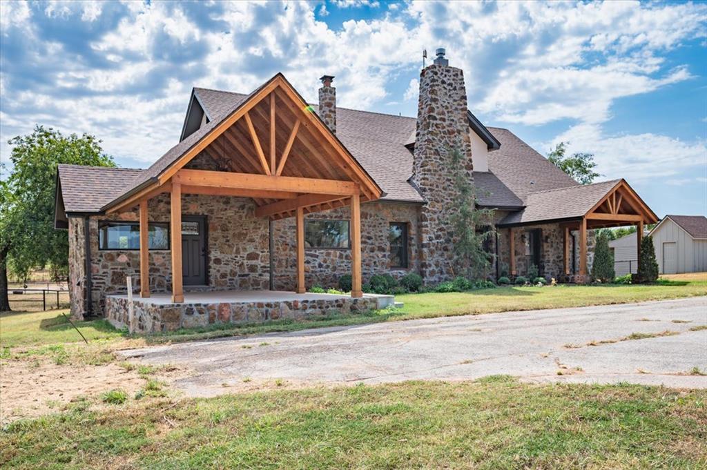This beautiful home blends refined comfort with thoughtful, high-quality upgrades throughout. Behind the scenes, the owners have invested in premium improvements including refinished hardwood floors, spray-foamed basement insulation beneath the wood flooring, a remote-controlled propane fireplace insert, fresh interior paint, tuckpointing exterior rockwork, new stucco, new landscaping, and a new well house. The lodge-style living area offers rich wood accents and an inviting atmosphere, while the eat-in kitchen features a dedicated dining space, butler’s pantry, pot filler, Jenn-Air range with gas cooktop, and a bread warmer—perfect for everyday luxury or hosting with ease. Combined with outstanding income-producing potential, this property delivers a rare blend of elegance, function, and long-term value.The property features a premier equine facility designed for boarding, training, and layovers. The large 18-stall barn includes a stud barn/tool shop, hot walker, hot/cold water, and two bathing stations with stocks. Additional amenities include a tack room, hay barn, and a bunk house inside the barn complete with kitchen, full bath, laundry, and one bedroom. Two mare/foal stalls, electric at each stall, garage doors, and sliding windows provide excellent airflow and protection during stormy weather.Outside, the property offers nine large paddocks where horses can graze and stretch comfortably. The layout supports established transport layovers and U.S. travelers, with **two RV hookups**, **ample space to turn a semi-truck **, and easy access for trailering. Located just **4 miles east of Remington Park Racetrack** and within **5 miles of both I-35 and I-40**, the setup provides exceptional convenience for boarders, haulers, and overnight layovers. Income potential is estimated at around **$20,000 per month**.