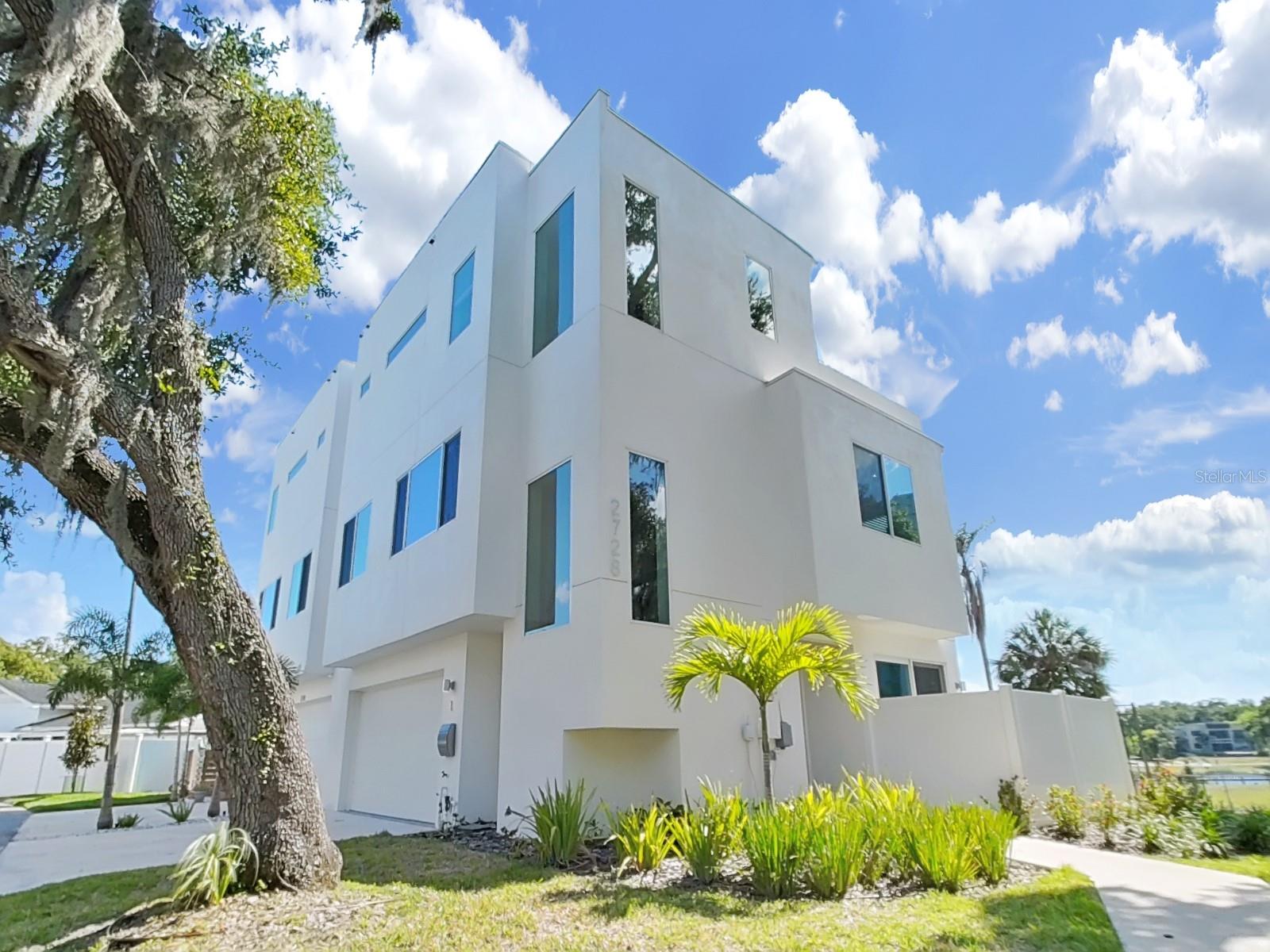 Welcome to luxury living just minutes from the heart of Downtown Tampa. Situated in the highly desirable Riverside Heights neighborhood, this contemporary 3-bedroom, 3-bathroom townhome combines sleek modern design with the tranquility of waterfront living. From the moment you walk in, you'll be drawn to the open-concept floor plan, filled with natural light and thoughtfully designed for both relaxation and entertaining.
The kitchen is a true showpiece, featuring quartz countertops, gas stove, high-end stainless steel appliances, custom cabinetry, and a spacious island that seamlessly connects to the living and dining areas. Step outside onto your private deck and take in breathtaking, unobstructed views of the Hillsborough River — the perfect backdrop for your morning coffee or evening unwind.

Each of the three bedrooms offers generous space, stylish finishes, and spa-like en-suite bathrooms. The primary suite is a serene retreat, complete with a large walk-in closet, dual vanities, and a sleek glass-enclosed shower. Throughout the home, luxury flooring and high ceilings enhance the clean, modern aesthetic, while smart home features and energy-efficient systems add convenience and sustainability.

With an attached garage and low-maintenance living in a quiet, upscale community, this home provides the perfect balance of peace and proximity. You're just minutes from Armature Works, the Tampa Riverwalk, Water Street, and some of the city’s best dining, shopping, and entertainment options.

Don’t miss your chance to own a modern townhome with riverfront charm in one of Tampa’s most vibrant and fast-growing neighborhoods. Schedule your private showing today.