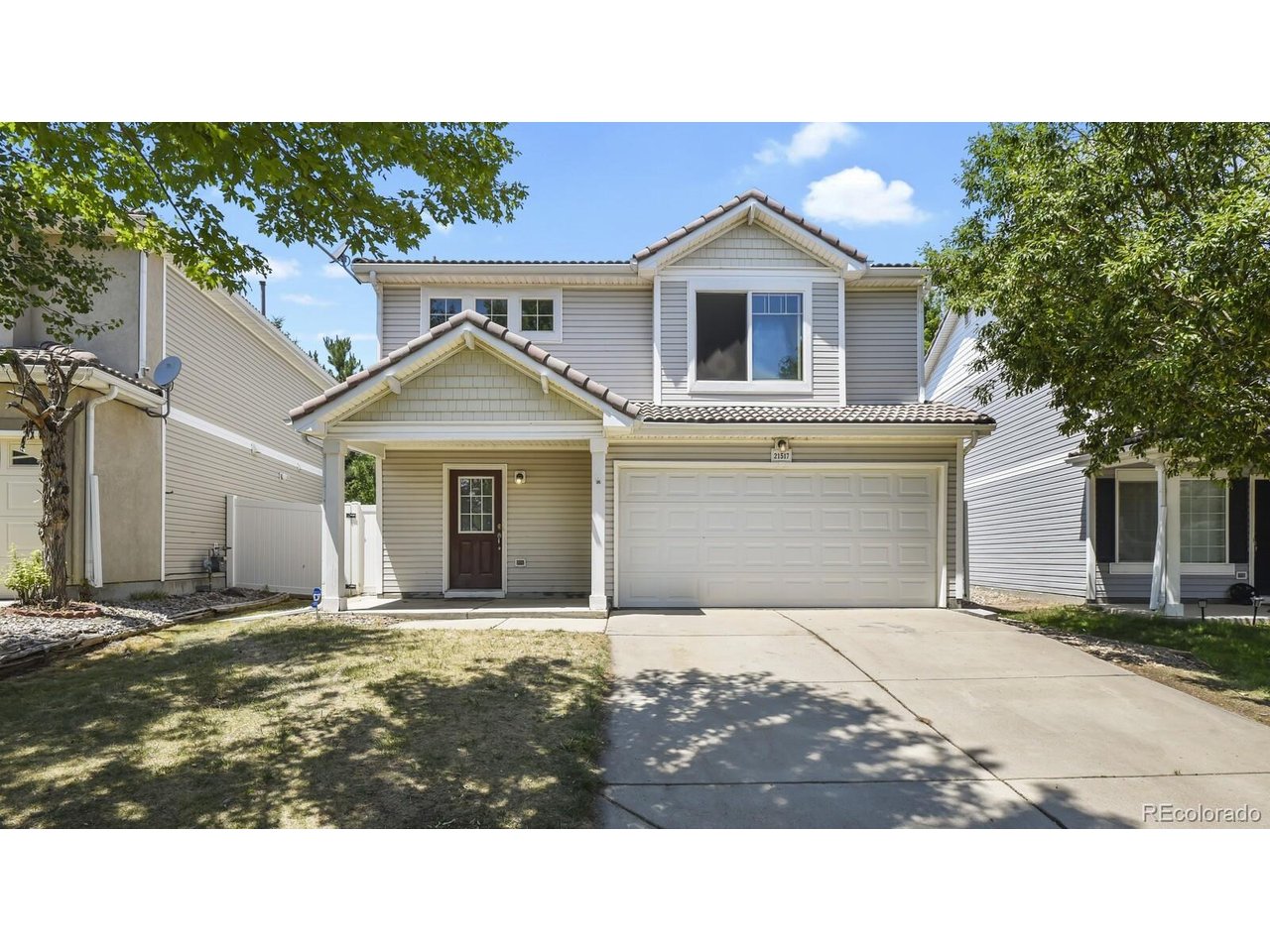 Situated on a quiet block and backing to the neighborhood trail, this 3-bedroom, 2.5-bath home offers comfort and a desirable location. SELLER OFFERING $10,000 IN CONCESSIONS FOR CARPET AND CLOSING COSTS! The main-level half bath is located just off the front entry, making it ideal for guests. The low-maintenance main floor features tile and laminate flooring throughout. The updated kitchen showcases distinctive wood cabinetry, a stylish tile backsplash, an upgraded faucet, a granite composite sink, and a spacious pantry closet for added storage and functionality.Upstairs, you'll find all three bedrooms, including a spacious primary suite with a full bath, large walk-in closet, and plenty of room for a sitting area or additional furnishings. A versatile loft provides flexible space for a home office, playroom, or media area. The laundry closet, complete with washer and dryer, is centrally located near the bedrooms for everyday ease. Both full bathrooms feature beautiful tile finishes and tile flooring. The home is completed with an attached 2-car garage, a low-maintenance backyard with split-rail fencing and mesh enclosure, and a large patio ideal for relaxing or entertaining. Don't miss this opportunity!