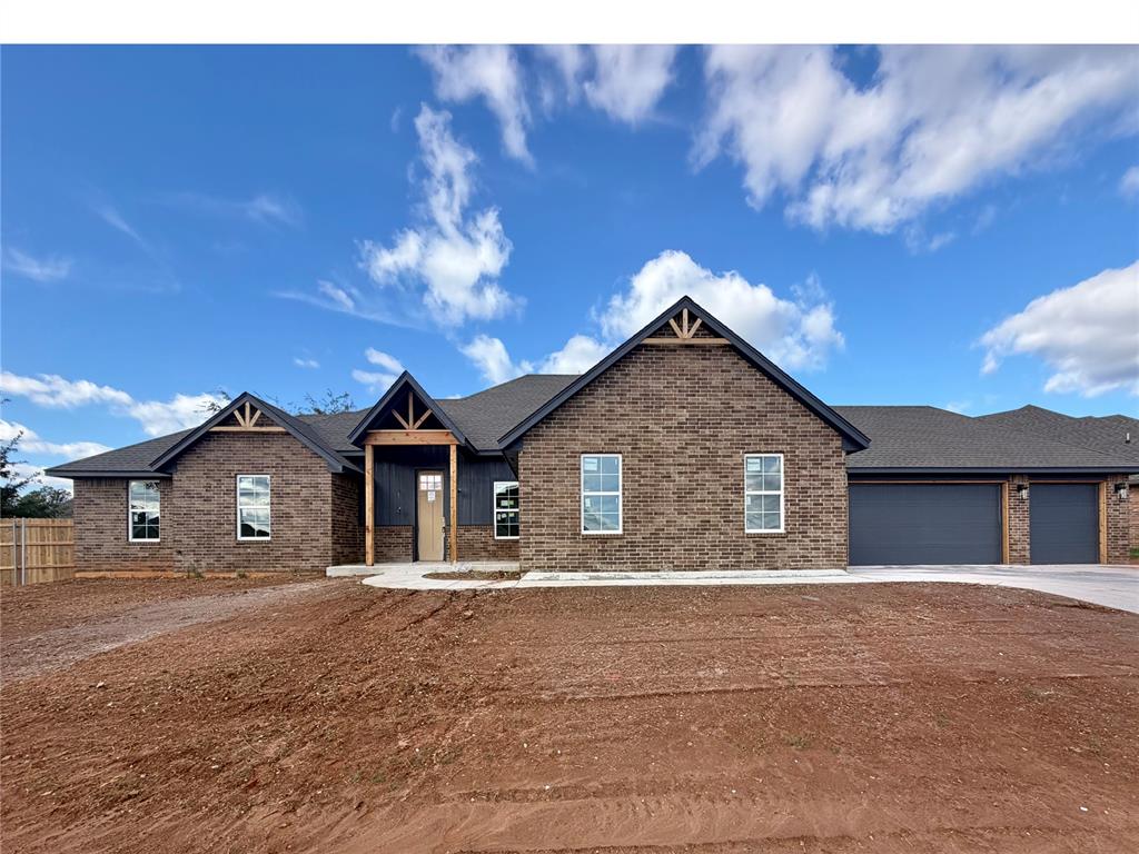 Welcome to The Camden in Summit Lakes! This 2,230 sq ft single-story home offers 3 bedrooms plus a flex room with its own closet, 2.5 baths and a 4-car garage. The flex room off the entry works well as a home office, guest space or hobby room. Raised 10-ft ceilings, crown molding and wood-look tile flow through the open living room with heat-producing electric fireplace, breakfast area and kitchen. The kitchen features a large island, tile backsplash, under-cabinet lighting, pantry and stainless built-in cooktop, oven, microwave and dishwasher. The primary suite is set apart with a walk-in closet, stand-alone tub, tiled shower and dual vanities. Split layout places the secondary bedrooms on the opposite side of the home. Italian marble vanities, Price Pfister faucets, a half bath and a utility room with cabinets. Smart features include a keypad smart deadbolt, smart switches and dimmers, Ecobee smart thermostat and LiftMaster MyQ garage openers, all app controlled. Energy-efficient build: 15 SEER A/C, 96% AFUE furnace, R-44 ceiling and R-15 wall insulation, low-E windows, sealed ducts, Tyvek wrap and insulated garage doors. Storm shelter included, plus hurricane straps, 1-year builder warranty, 10-year structural warranty and 5-year termite warranty. Outside, enjoy a covered patio, full sod, landscaping, Rain Bird sprinkler system, brick mailbox and a brick, stone and siding exterior. Summit Lakes amenities include catch & release lakes, walking and biking trails, picnic areas, basketball court, soccer field and playground.