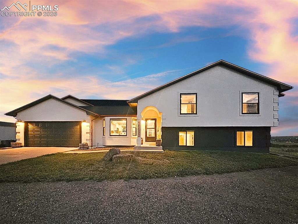 Nothing Like it - Large 5 Bed / 3 Bath Modern Farmhouse that sits atop of this Massive 18.9 Acres. Truly a 360 Degree View Property. Views of Pikes Peak, Sangre De Cristo Range, Spanish Peaks, & City Lights to the North. Located just 3 miles West of 1-25. Upon your breathtaking arrival, an expansive, asphalted driveway, cedar fencing, stucco finish, new roof & copper gutters, warm lighting. Enjoy wide plank flooring, tons of natural light, cathedral ceilings - an airy & comfortable feel. The heart of this home is a Beautifully Crafted Kitchen w/ space to gather, mountain range views, gleaming, quartz countertops, backsplash, custom storage system w/deep cabinets & pull-outs and lights, defined by its' stainless-steel appliances, w/ double-oven. Enjoy a built-in bar, for entertaining & creating a sense of grandeur. As you retreat, savor this huge primary en-suite w/ standing shower, separate tub, dual vanity, two walk-in closets. An additional two bedrooms w/ shared bath. Downstairs, a well-appointed bed/office, laundry room, bathroom, & family room. A cozy fireplace for those chilly Colorado nights. In one corner of the room, a reading nook beckons, perfect for productivity or relaxing. A HUGE basement that stays cool year-round that includes a 5th Bedroom/Bunk Space with Massive 16x6 walk-in closet w/ FH Door. Add'l 20x6 Storage Room w/ 4 Built-in Lockers, matching FH Door. For the outdoor enthusiast, walk-out through the French doors, & enjoy the captivating, cedar fenced 25x80 Pavestone deck---the cedar smells amazing! Equipped w/16x6x3 cedar table w/metal roofing, & metal-framed greenhouse. Which backs to open space & wildlife. The sunrises & sunsets against the natural landscape are invigorating. Starlink® is available, Storage, HVAC Room, Sub Pump Room, Water Room, Plat Map, Parking for 10+ cars, Heated Garage/Shop, RV Parking w/220, Public Water, Maintained Roads, NO HOA. When you dream, this is the house that that will exceed your expectations.