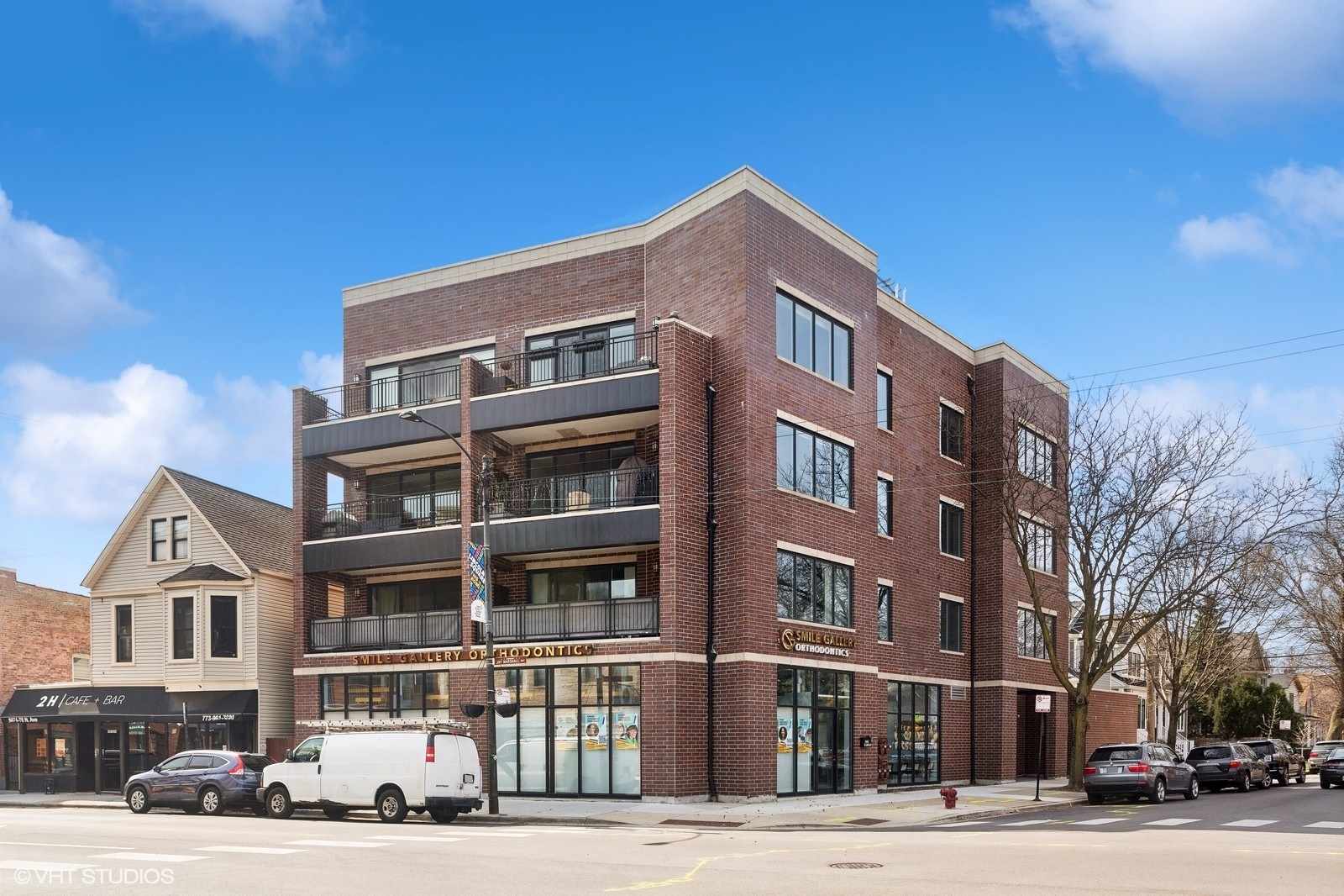 Experience modern luxury in this stunning 3-bedroom, 2-bath residence at The Legacy Lincoln Square, a boutique eight-unit elevator building built  in 2020. This one of a kind unit was thoughtfully designed by Jasmin Reese Designs and featured in Modern Luxury Interior Chicago! Overlooking Carmen Ave. (not Lincoln) this unit features soaring 10-foot ceilings, abundant natural light, and a thoughtful open-concept layout creating an inviting sense of space. The designer kitchen features Jenn-Air stainless steel appliances, custom Siteline cabinetry, Caesarstone quartz countertops, and Signature Hardware fixtures, all complemented by white oak hardwood floors throughout. The spacious primary suite offers a spa-inspired bath, while two additional bedrooms provide flexibility for guests, an office, gym, or hobbies. Enjoy attached garage parking with EV charger and unwind on either your own private terrace (west facing for great sunsets) or the finished common rooftop deck with sweeping skyline views. Nestled on a quiet corner in the heart of vibrant Lincoln Square, this home offers easy access to shops, dining, parks, and public transit, all within highly rated Budlong Elementary and Amundsen High School boundaries. Great unit you won't want to miss!