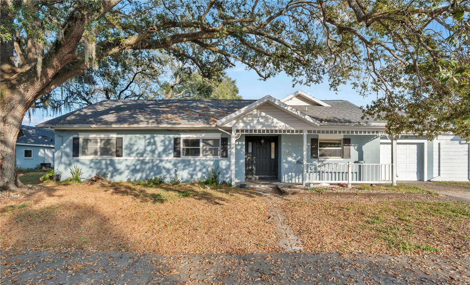 Discover this solidly built 3-bedroom, 2-bath block home featuring classic terrazzo floors and an updated roof maintained entirely by the Homeowners Association for easy, worry-free living. Step inside to a bright and functional kitchen complete with newer wood cabinetry, durable Formica countertops, and a convenient pass-through window to the dining area—perfect for serving meals or entertaining guests.The open living and dining areas flow seamlessly and overlook the expansive community greenspace. Just beyond your backyard sits the heart of the neighborhood: a beautifully maintained community center, a sparkling swimming pool, and an inviting play yard. Whether you're enjoying a quiet afternoon, hosting a get-together, or watching the little ones laugh and play, this shared open space adds an incredible sense of light, air, and connection.One of the greatest advantages of living here is the hands-off lifestyle. The HOA covers all yard cutting, ensuring consistent curb appeal without the weekend chores. You’re welcome to add touches of minimal landscaping if you enjoy gardening, but it’s entirely optional—perfect for those who want the freedom of a home without the constant upkeep.This neighborhood is known for its friendly atmosphere, walkable streets, and the strong sense of community among neighbors. The community center often becomes a gathering spot for seasonal celebrations, informal meetups, and neighborhood activities. With the pool, play yard, and large open common areas, there’s always a place to relax, unwind, or mingle.Originally built as Navy housing, these homes are recognized for their durability and thoughtful design—including a built-in safe room. Many owners use this versatile space as a playroom, home office, storage area, hobby room, or even an additional bedroom. It’s also an incredible asset during storm season.Two functional bathrooms await your modern touch if desired, and the oversized one-car garage offers ample space for storage, tools, bikes, or hobby equipment.Altogether, this home offers the perfect blend of low-maintenance living, solid construction, and a warm, welcoming community—an ideal setting for relaxed Florida living.