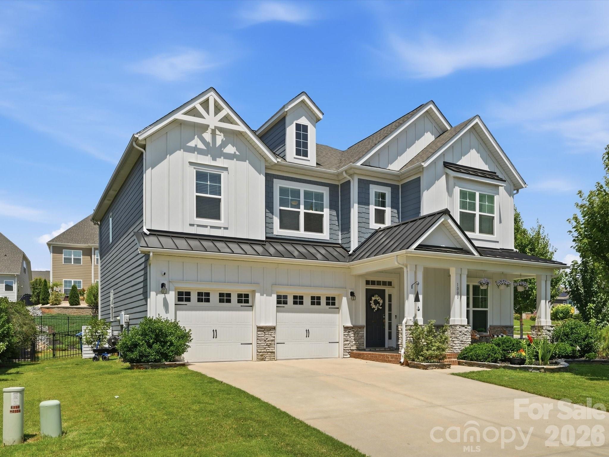Welcome home to this beautiful, move-in ready home that truly checks all the boxes. Thoughtfully designed with both everyday living and entertaining in mind, you'll love the guest suite on the main floor, spacious open-concept great room, light-filled kitchen, oversized pantry, and dedicated e-zone that's perfect for working from home, homework, or managing the day-to-day. Plantation shutters throughout add timeless charm and an elevated touch. Upstairs, you'll find a spacious loft, generously sized secondary bedrooms, and an incredible primary suite complete with a spa-like bathroom and oversized shower that feels like your own private retreat. Every space in this home feels open and functional while still maintaining a warm, inviting atmosphere. Step outside to the fenced backyard, ideal for relaxing, entertaining, or simply enjoying a little extra privacy. Located in highly sought-after Millbridge, you'll have access to award-winning amenities including multiple pools, a lazy river, pickleball courts, walking trails, a fitness center, playgrounds, a clubhouse, café, and endless community events. It's the kind of neighborhood where neighbors become friends and there's always something happening. This home truly is the complete package.