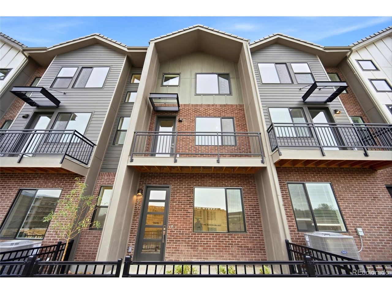 This luxury townhome showcases the sought-after Kelly floor plan, thoughtfully designed and beautifully finished in the Aspen interior package, creating a bright, airy, and inviting aesthetic. With 2,056 square feet thoughtfully arranged across three levels, the home seamlessly blends style, comfort, and versatility-ideal for growing households, working from home, or anyone seeking additional space without compromising convenience in a prime Inverness location. The entry level welcomes you with a private bedroom and full bath, offering an ideal retreat for guests, a home office, or multi-generational living. On the main level, natural light pours into the open-concept great room, centered around a sleek electric fireplace that adds warmth and contemporary appeal. The gourmet kitchen pairs sophisticated design with everyday functionality, featuring a quartz island with seating, a walk-in pantry, and a neutral color palette complemented by crisp white quartz countertops. Together, these finishes capture the fresh, mountain-inspired character of the Aspen package. Upstairs, the spacious primary suite provides a serene escape, complete with a spa-inspired five-piece bath and an expansive walk-in closet. Two additional bedrooms, a full bath, and a conveniently located laundry room complete the upper level, creating a well-appointed space designed for both comfort and efficiency. Additional highlights include a private balcony, attached two-car garage, soft-close cabinetry, and premium Samsung appliances. Ideally situated within a peaceful corner of Inverness, this home delivers a low-maintenance lifestyle with exceptional access to Park Meadows, the Denver Tech Center, light rail, and highly regarded Cherry Creek schools.