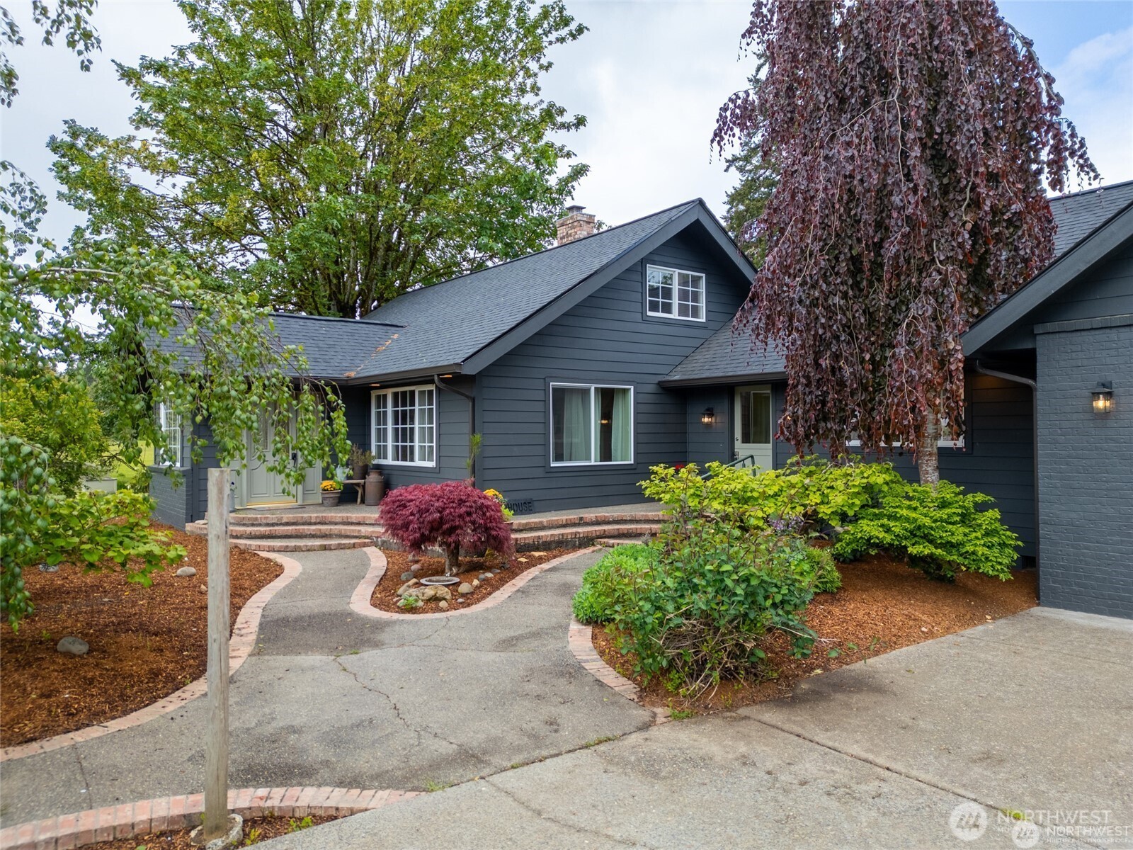 Fully remodeled 5-bedroom, 3-bath home on 40+ acres along the Chehalis River! This incredible property features a spacious deck, greenhouse, caretaker quarters and the Olive & Owl Event Center—equipped with a full commercial kitchen, stylish dining room, commercial bathrooms, and luxurious bride and groom suites. Ideal for both private living and business, the estate offers stunning natural beauty, income potential, and modern updates throughout. A rare opportunity to own a turnkey home and event venue in a breathtaking riverside setting!