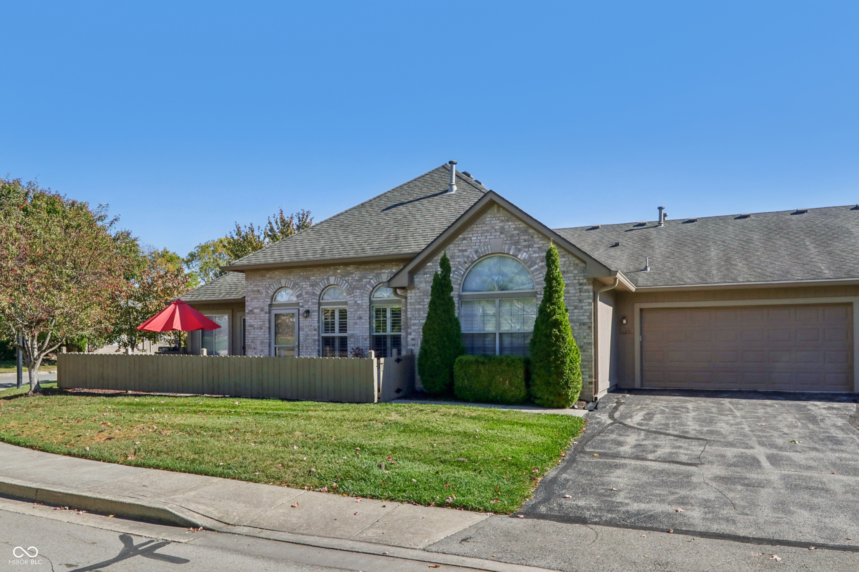 HUGE PRICE REDUCTION! Welcome to this impeccably maintained 2-bedroom, 2-bath ranch-style condo with sun room offering a bright, open floor plan and effortless main-level living, all on a corner lot! The spacious great room with cozy gas fireplace flows seamlessly into the dining area and kitchen - ideal for both everyday living and entertaining.The thoughtfully designed split bedroom layout provides privacy, with one bedroom on each side of the home. A versatile laundry room doubles as a butler's pantry and coffee station, while the bright sun room room with patio slider opens to the courtyard for quiet relaxation. The primary ensuite features a large, low-threshold shower with seat, while the guest bath offers a second low-threshold shower for added convenience. The kitchen is appointed with stainless steel appliances, all replaced within the last two years. Recent updates ensure peace of mind, including new HVAC (2024), water heater and water softener (~3 years). Enjoy maintenance-free living with exterior care, mature trees, lawn service, snow removal, and roof/paint included in the HOA. Community amenities include a clubhouse with fitness and gathering rooms, pool, and putting green.