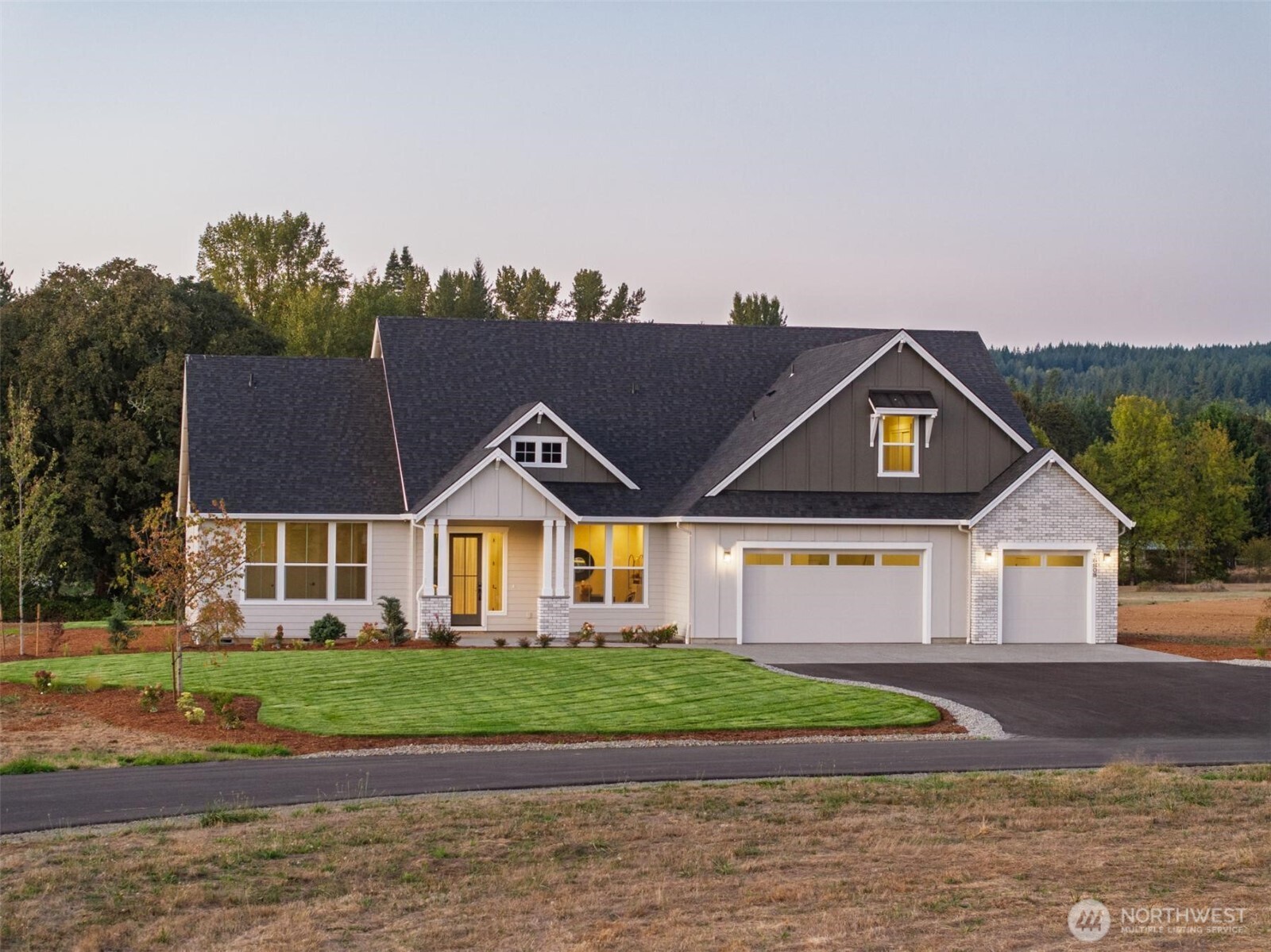 HOME TO BE BUILT!  THE CASCADE by GARRETTE HOMES – on an land in a GOLF COURSE COMMUNITY! This stunning home features a 12-foot sliding door off the great room, creating a seamless indoor-outdoor connection to a covered patio with an outdoor fireplace. The spacious kitchen includes an impressive 8-foot by 4-foot island. The primary suite is located on the main floor and offers private access to a covered patio, a freestanding soaking tub, and dual walk-in closets. Photos for inspiration only. Actual finishes and features may vary.