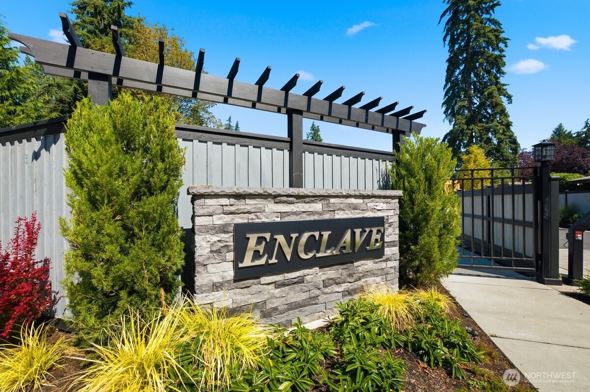 Welcome to Enclave – a new, exclusive gated community in Edmonds.  This craftsman-inspired home is filled with too many amenities and features to list, including 9’ ceilings, custom moldings, paneled walls, built-in beverage coolers, walk-in closets with organizers, two laundry rooms, quartz countertops, custom lit cabinets, and epoxy garage floor. This list goes on and on.    The first floor features a guest suite with its own kitchenette, walk-in closet, bathroom, and laundry room.  The great room on the second floor showcases a large kitchen with high-end Bosch appliances, pantry, electric fireplace flanked with built-in lighted cabinets, breakfast nook/dining area, and French doors leading to a covered deck.     On the top floor, you’re greeted by double doors leading to the primary bedroom with a cathedral ceiling and territorial views.  From there, enter a spa-inspired primary bathroom with soaking tub, heating floor, towel warmer, bidet, skylight, and frameless glass shower.  The top floor has a loft area, two more bedrooms with walk-in closets, the main laundry room, and a second full bath.  Relax and enjoy.