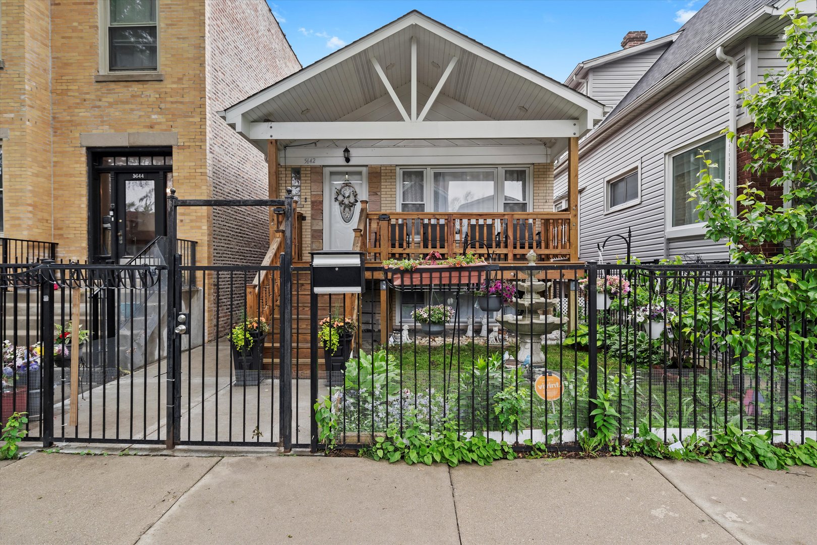 Beautiful brick raised ranch in portage park in excellent condition with a large wooden deck. 4 bedrooms, 2.5 baths, kitchen with 42" maple wood cabinets, granite countertop with glass back splash, stainless steel appliances. Master bedroom with 1/2 a bath, finished basement with all ceramic flooring, huge family room with a fireplace and a wet bar with granite countertop. Newer roof with guard leaf gutters (maintenance free), 2.5 car garage with a cemented patio. Iron fence at the front of the house. Laundry room with laminated flooring and a lot of cabinets. Back yard is all cemented.