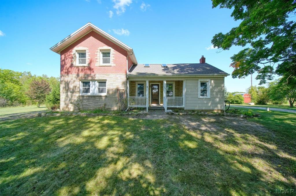 Welcome home to a stunning farmhouse sitting on 45.5 acres in Madison Township! This home has been beautifully renovated from top to bottom, with a newer roof, well, A/C, windows, flooring, cabinets, appliances, and more! The vaulted ceilings, and wood beams add to the old farmhouse charm! Outside offers a 2-car garage with a lean-to, fenced yard, and trails to the back private pond! Don't miss out on your chance to own a one-of-a-kind secluded paradise!