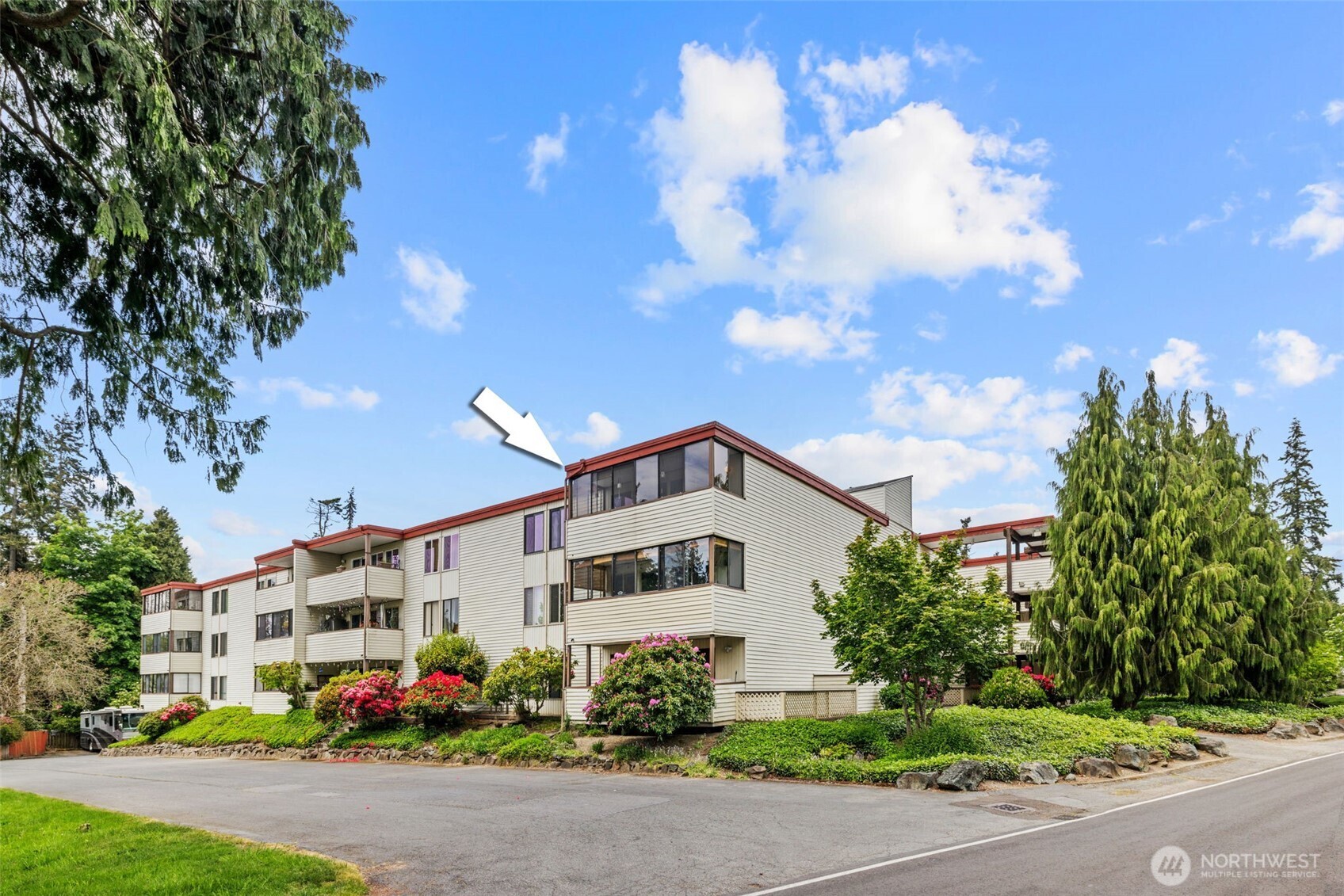 Don't overlook this Beautiful Top floor, end-unit just minutes from downtown Edmonds! Southwest facing w/ light filled territorial views is a must see! Featuring 2-beds, 1.75 bath. This nicely sized open floor layout has newer appliances and quality flooring throughout! Kick back after a long day on your extended Veranda watching the sunset! Master bedroom boasts a large walk-in closet w/ private ensuite bath + ample storage. This unit comes with secured garage parking + storage space and W/D in unit. Well ran HOA includes W/S/G, High-speed internet & Cable! Heated outdoor pool, entertainment room, lobby/mailroom +exercise room and sauna! Many wonderful features about this community, truly a great place to live!
