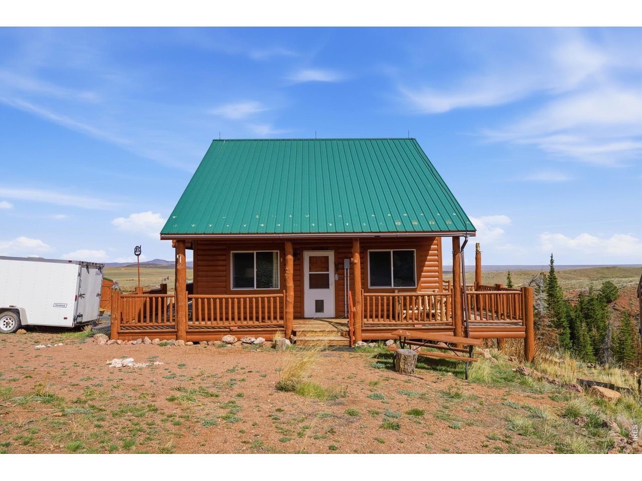 Welcome to your private mountain escape. This fully furnished 2-bedroom cabin with an office (perfect as a non-conforming third bedroom) sits on 40 beautiful acres, offering peace, privacy, and incredible views in every direction. Inside, the cabin is turn-key and thoughtfully equipped with everything you need to feel at home right away. A walkout basement adds extra space and flexibility. Though the property is off-grid with seasonal access, it's set up for comfortable living year-round with a well, full solar system and three propane tanks supporting heating and appliances. Additional storage sheds provide plenty of room for your outdoor gear, tools, and recreational equipment. The property is surrounded by aspen groves, evergreens, and lush open areas that naturally attract deer, elk, and moose and with two private ponds, you'll enjoy a setting that truly feels connected to nature. Residents also enjoy private fishing access to the rivers and creeks that wind through Sand Creek Park, stocked annually for great fishing opportunities by the HOA (only $120 annually). A great opportunity for outdoor enthusiasts seeking space, exploration, privacy, and a peaceful mountain setting. Please note that home is not actually in Red Feather's lake even though it's in the address.