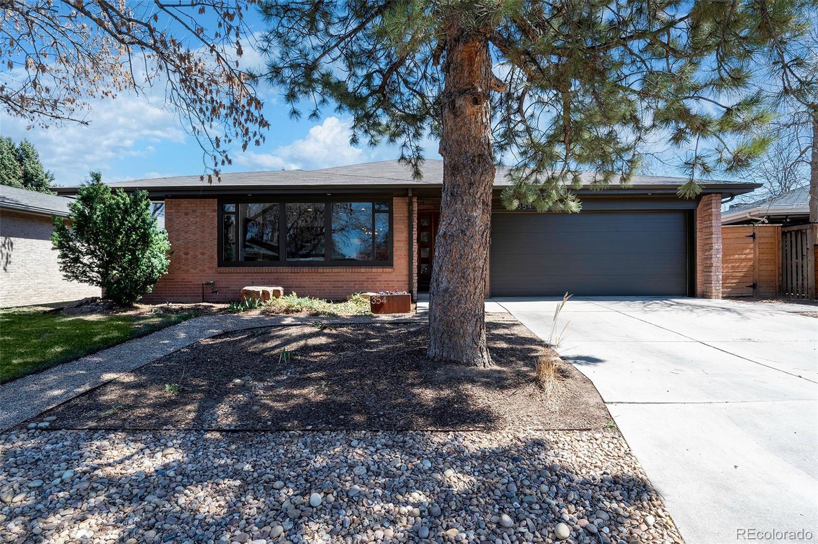 Amazing opportunity in Winston Downs! This thoughtfully designed 4 Bedroom // 3 Bathroom Residence offers an efficient open floor plan hosting an abundance of natural light.  You will find the perfect blend of convenience and functionality along side modern updates from the moment you step inside.  Upon entering you will find a cozy family room w/ an electric fireplace and picture window. The home is centered around a chefs kitchen that lends contemporary two tone cabinetry, quartz counters, glass subway tile backsplash, Bosch Oven and microwave, gas range, stainless dishwasher/refrigerator/range hood and beverage refrigerator.  Flowing from the kitchen is a formal dining room and glass enclosed patio for an additional seating or dining space.  Hardwood flooring throughout the entire main level accented by tile in the entryway, kitchen and baths.  The Owners Retreat is generous in size and incorporates a private bath w/ chic tile accents and walk in closet.  There are 2 additional oversized bathrooms and full renovated bathroom and laundry room on the main level.  A finished basement provides LVP throughout, a secondary great room, office nook, conforming bedroom with egress window and 3rd Bathroom.  Comfortable East facing backyard living with a covered patio, mature landscaping and flower beds.  2 Car attached garage.  Insulated attic. Winston Downs is the perfect location just minutes from Cherry Creek and Lowry and quick access to Downtown and DTC while only being 30min from DIA.