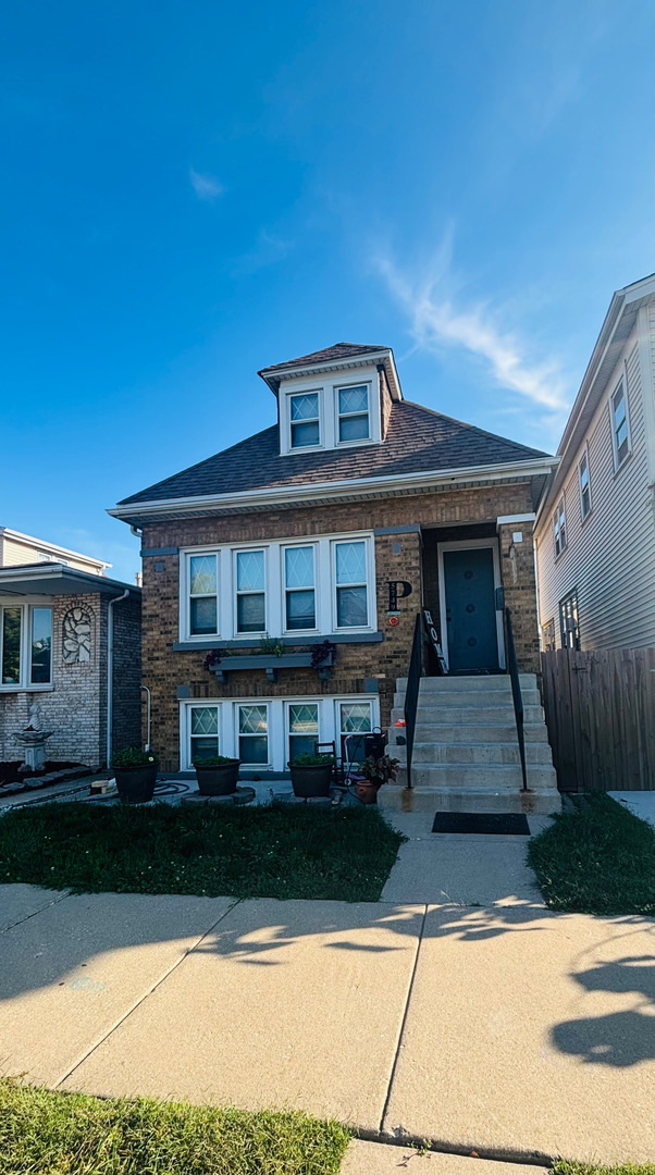 Welcome to this beautifully rehabbed home  featuring both a main dwelling and a charming coach house. This solid brick property offers multiple income opportunities, with tenants already in place in the basement and coach house providing excellent passive income. The home boasts a strong brick exterior and durable roof, ensuring peace of mind for years to come.    Inside, the updated bathroom offers a luxury feel with a warm, inviting design. The spacious attic is a blank canvas, ready for the new owners to bring their vision and color choices to life. Conveniently located near schools, shopping, dining, and sports facilities, this home provides both comfort and accessibility. Low taxes make this property an even greater value.    Don't miss your chance to own a move-in ready home with income potential and plenty of space to grow!