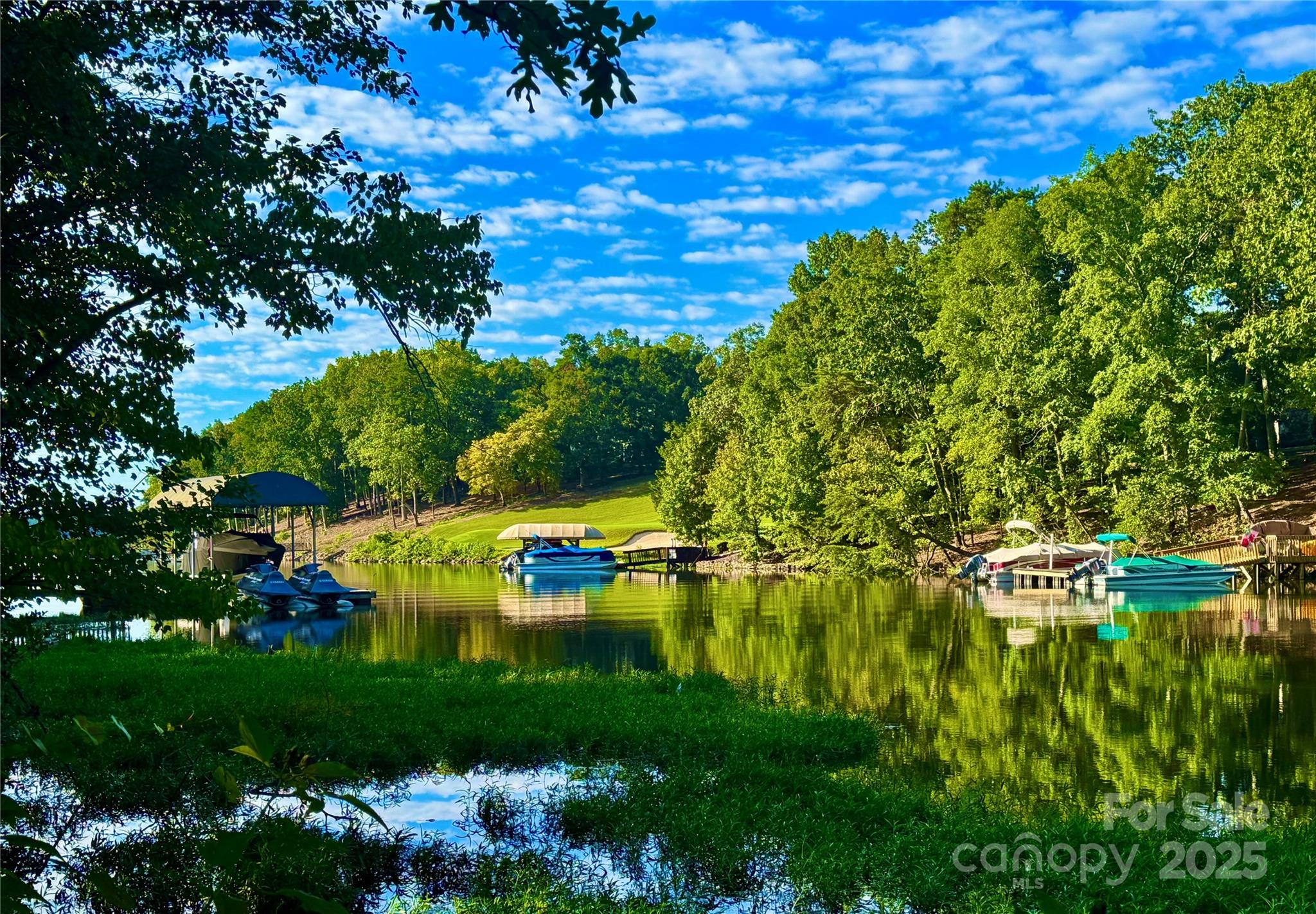 Beautiful lake front nearly flat lot located in the Long Cove neighborhood of the Old North State Club community. Build your custom home where you can enjoy spectacular water views of Badin Lake. This lot qualifies for a single pier when a home is under construction. Enjoy all the privacy this lot has to offer. With membership gain exclusive access to Old North State Golf Club - a nationally-renowned golf course that just underwent a multimillion dollar renovation. The club amenities include swimming pools, tennis/pickle ball courts, a full service marina, clubhouse, walking trails, a fitness center, an active social calendar, and much more. Just an hours drive from Charlotte, Greensboro, and Winston; and two hours from Raleigh.