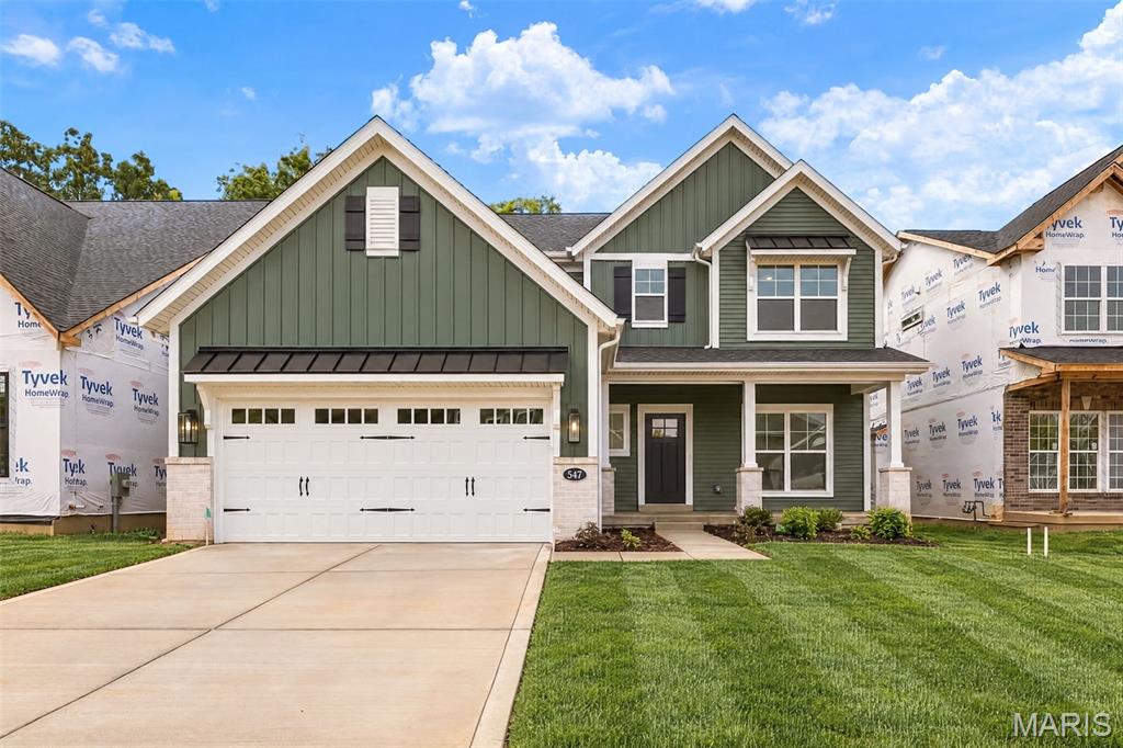 Move In Ready! Stunning, new construction by Fischer and Frichtel in Ryehill Manor in St. Peters. This dynamic 2 story home will wow you! The curb appeal is impressive with board and batten siding, brick, arch shingles, metal accent roofing, carriage style garage door, full sod, landscape and lawn irrigation. Features include 3 bedrooms, 2.5 baths, 2,468 sq ft, 9 ft ceilings on the main floor, luxury vinyl plank flooring throughout the main level, Flex Room/Dining Room, side staircase design, wrought iron stair spindles, main floor Laundry, 2 panel doors, 5.25 inch baseboards, 42 inch Shaker style White cabinets with crown, contrast island with seating bar, pendant lights, recessed lights, soft close doors and drawers, dovetail drawer construction, quartz countertops, tile backsplash, under cabinet lighting, walk in pantry, stainless steel appliances, gas range, chimney style hood, microwave, refrigerator, dishwasher, double door entry to the Primary Suite, walk in closet, cultured marble shower, free standing soaking tub, raised height dual vanities, large secondary bedrooms, spacious Loft, HVAC zoned system, 50 gal water heater, Low E windows, rough in bath and a 12x12 composite deck with steps to a 14x12 patio. The garage has added depth and an insulated garage door with opener. This single entrance neighborhood offers easy access to Hwys 70 and 370, shopping, restaurants, services and The St. Peters Rec Plex. Ryehill Manor residents will receive a 3 year paid membership to the spectacular St. Peters Rec Plex.