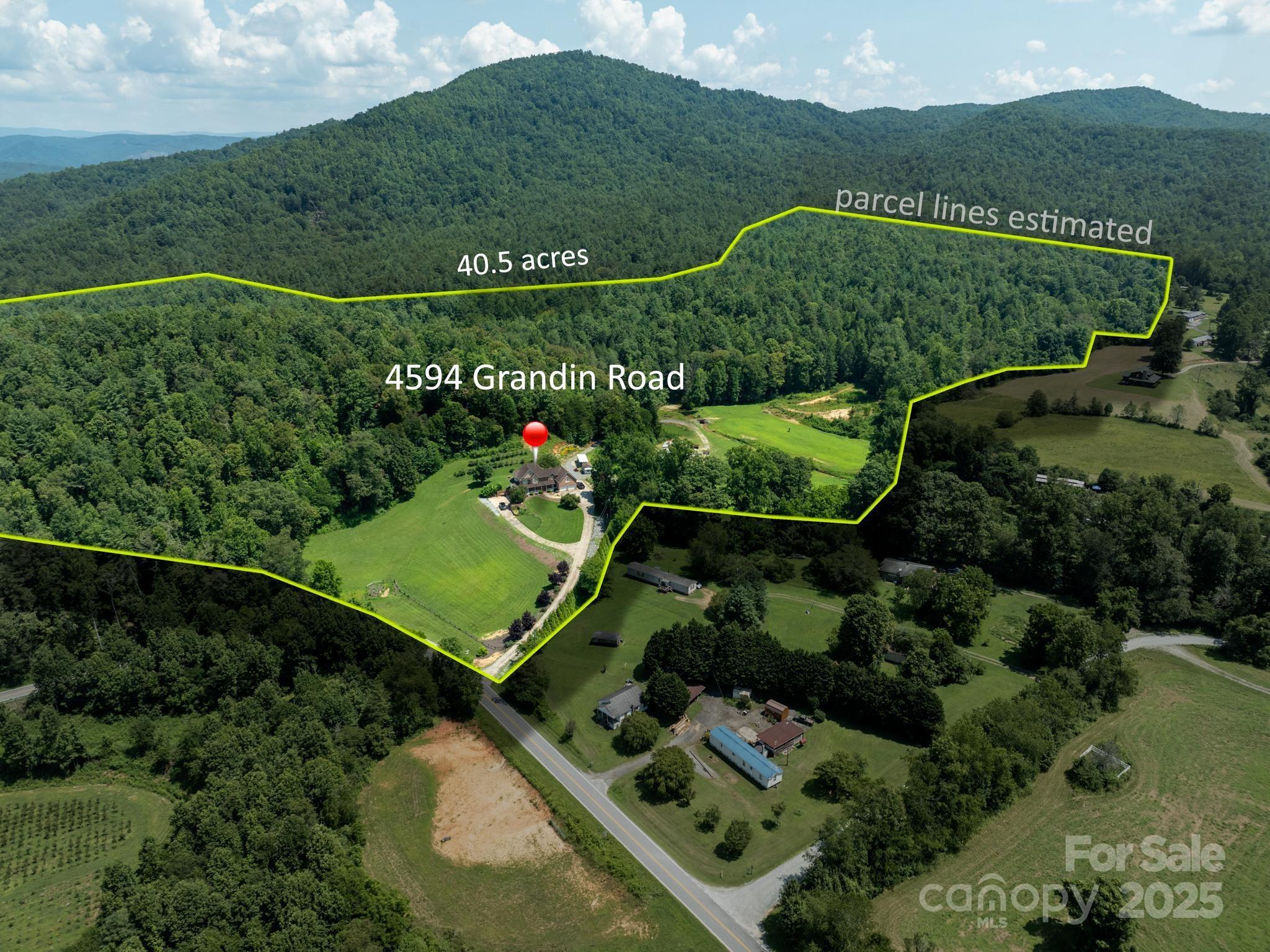 Discover the perfect blend of natural beauty and endless potential at 4594 Grandin Road in Lenoir, NC. This exceptional 40-acre tract offers privacy, serenity, and stunning long-range mountain views—ideal for building your dream estate, homestead, or private getaway. With a mix of open pastures, mature trees, and gently rolling terrain, the possibilities for development, recreation, or agricultural use are endless. A cleared homesite and existing driveway are already in place, offering a head start on your vision. Located just a short drive from downtown Lenoir, this property provides the peace of rural living with convenient access to town amenities. No HOA, no restrictions—just pure mountain land ready for your imagination.