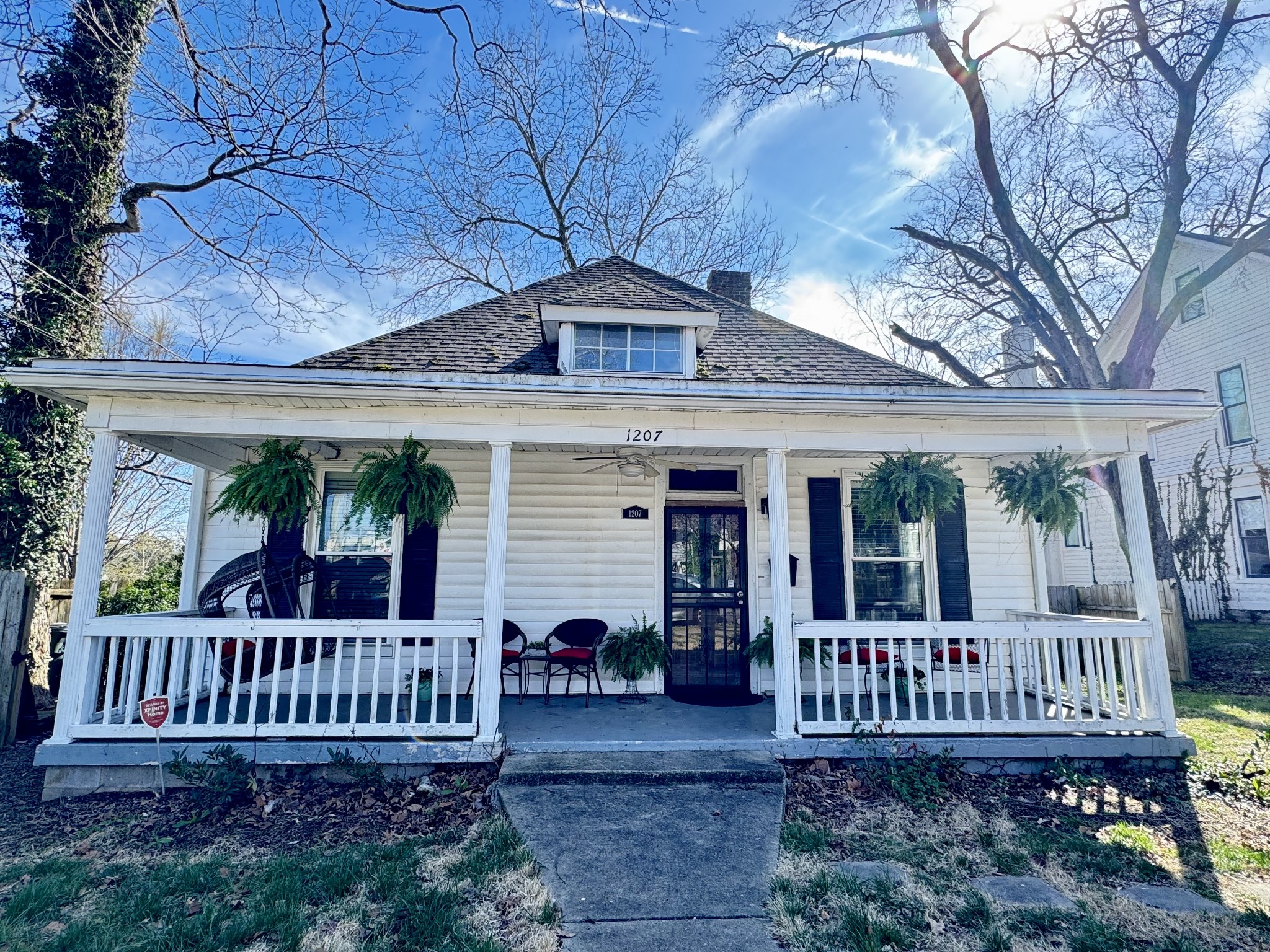 AMAZING LOCATION!! Walk to everything 12 South.Charming street filled with beautiful homes. Cute historic home with large fenced backyard and air conditioned shed that can be used as studio/workshop. Can become your dream cottage with renovations of your choosing  Home is in Neighborhood Conservation Zoning Overlay, so it can't be torn down. Pics showing furnished for your inspiration. Being sold "as is".