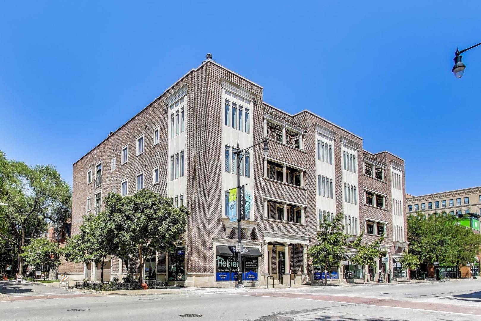Massive highly upgraded combined penthouse unit in Lincoln Park in an intimate elevator building! Over 2700 square feet of living space on one level for super convenient single family home-like living. This northeast facing 4 bed 3 bath plus office also features a large main living and dining space with extra built-in bar with beer tap system and wine fridge perfect for entertaining parties of all sizes. Kitchen features high-end stainless steel appliances including Viking stove and hood, with pot filler. Additional living room with fireplace gives the home a separate hangout space without having to be on a separate level. Significant upgrades to lighting, hardware, crown molding, and remodeled white primary bath with steam shower. Terrific storage space with professionally organized closets. The unit also features 2 balconies and a huge 1000 sqft private rooftop deck with views of the city skyline, a large pergola for shade, and plenty of space for entertaining and relaxing in a peaceful retreat above the vibrant neighborhood of Lincoln Park! This unit comes with 3 heated garage parking spaces (one tandem). Close to parks, dining, shopping and so much more! Part of Oscar Mayer school district. Come see this truly unique space with your private outdoor oasis!