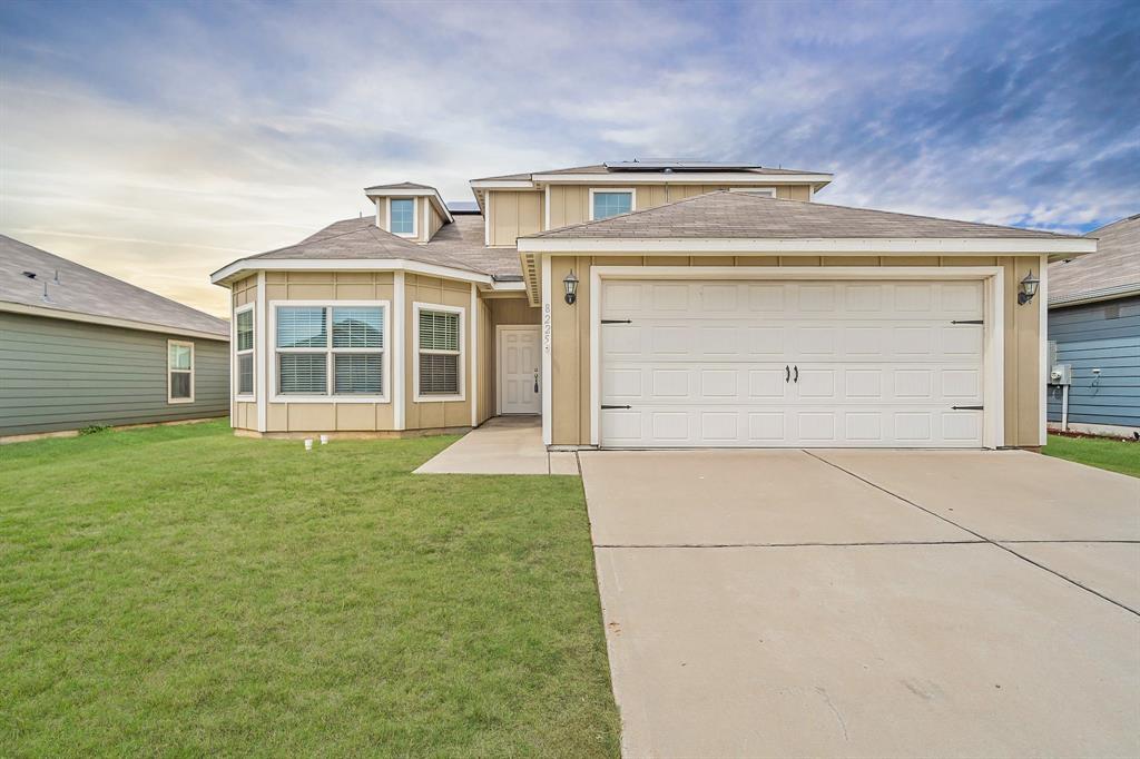 Better than new! SOLAR PANELS PAID OFF AT CLOSING! This beautifully maintained 4-bedroom, 2.5-bath home has been refreshed with interior paint and brand-new carpet throughout! The oversized main-floor primary suite offers a true retreat with a spacious en suite bath featuring a garden tub, separate shower, and a generous walk-in closet. The open-concept kitchen is equipped with granite countertops, stainless steel appliances, and plenty of storage, seamlessly connecting to the living and dining areas for easy entertaining. Upstairs, you’ll find three additional bedrooms and a full bath, perfect for family or guests. What truly sets this home apart are the PAID-OFF solar panels—providing the new owner with years of energy savings and eco-friendly living. With spacious room sizes, a backyard ready for anything you can envision, and a floor plan designed for comfort, this home delivers unbeatable value in a sought-after Fort Worth community.