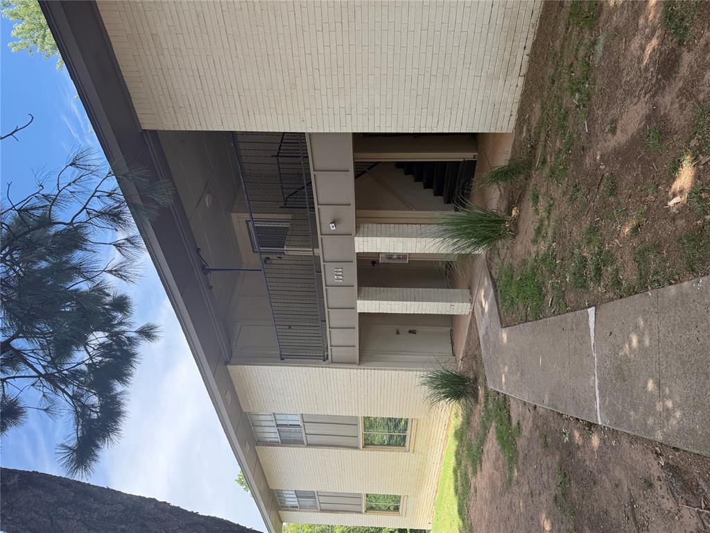 Second floor condo located in a quiet area near college campus and city park.  The complex has its own swimming pool.  Outside storage utility closet can hold your bike or out of season items.  New carpet in living room and bedrooms. New walk-in shower in primary bathroom.   The HOA fee includes monthly water, sewer and trash.  All you pay is the electric bill.  This unit has 3 bedrooms, 2 full bathrooms.  The laundry room has room for a full-sized washer and dryer that stay with the home.  The living room features a cozy wood burning fireplace.  The refrigerator in the kitchen will stay.  Two parking spots are located near the door of the condo for this unit.  New roof in 2021.