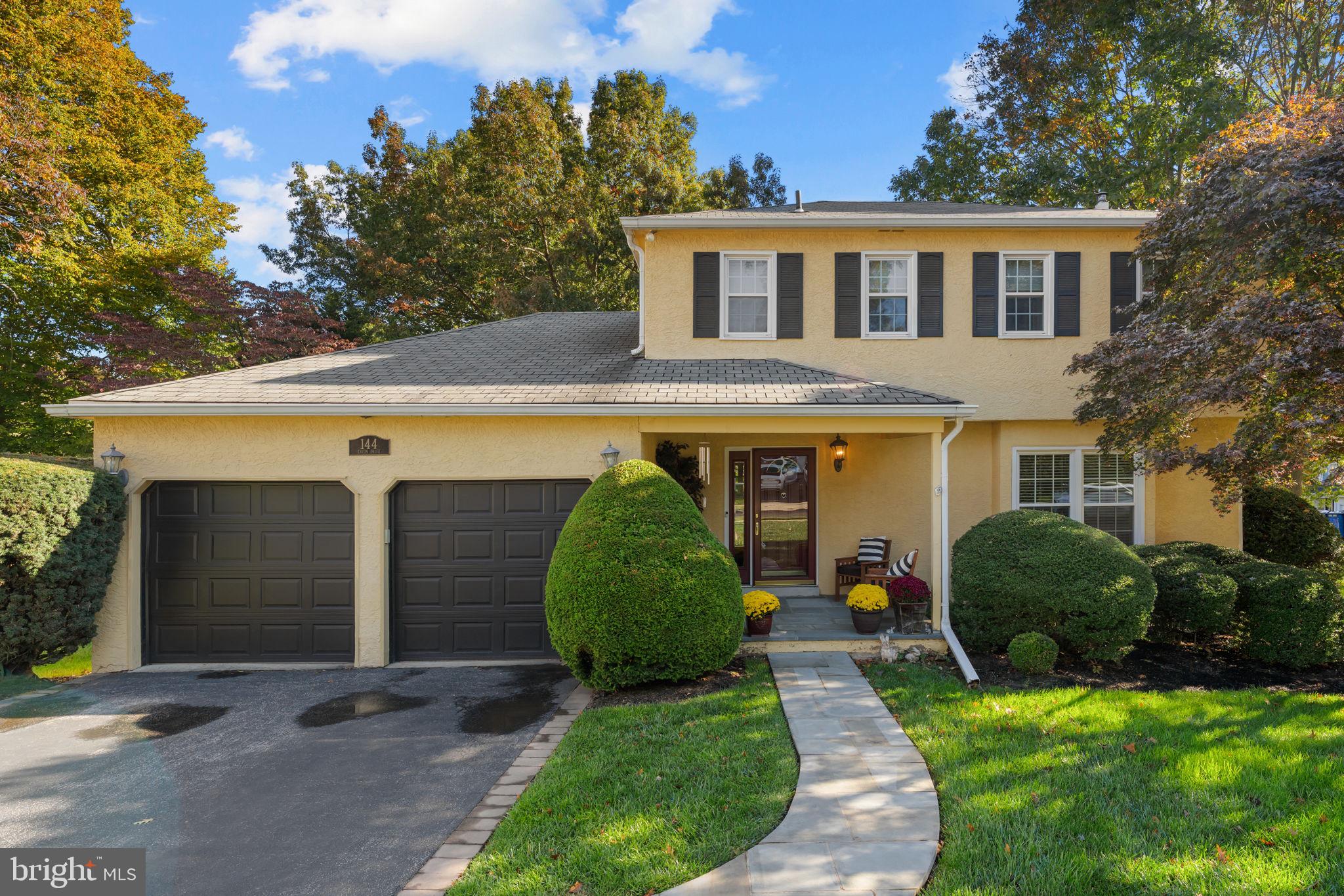 .This beautifully updated 4-bedroom, 2.1-bath center hall colonial blends open spaces and modern functionality, all set on a level lot in a prime neighborhood. Nestled in a sought-after cul de sac community with sidewalks, shared green spaces, and easy walkability to nearby parks, this home truly checks every box. A welcoming flagstone front porch leads into a spacious foyer with a double closet. The updated Kitchen features custom 42-inch cabinetry with crown molding, granite countertops, peninsula island, under cabinet & recessed lighting, gas cooking, and stainless-steel appliances. It opens seamlessly to a fireside Family Room with built-ins, crown molding, recessed lighting, and access to the rear deck. A Formal Living and Dining Room adds elegant touches with large windows, hardwood floors, crown molding and chair rail detailing.The expanded Laundry/Mudroom includes wainscoting, a designer updated Powder Room, and convenient inside access to the two-car Garage. Upstairs, the Primary Suite offers his-and-her closets and a beautifully renovated Primary Bath with tile flooring, custom pull-out cabinetry, floor to ceiling tiled shower with frameless glass enclosure. Three additional bedrooms, a second updated full Bath, hall closet and two attic spaces provide generous storage.The finished Basement adds flexible living space with wainscoting, recessed lighting, and a mix of laminate and carpet flooring—perfect for play, work, or relaxation. Outdoor living is just as inviting, with mature landscaping, paver bordered driveway,  a composite deck, flagstone porch, side yard and adjacent common area behind the property and up the street.All this in the top-ranked Radnor School District, with easy access to the R-5 train to Philadelphia, local restaurants and shops, major commuting routes, and vibrant downtown Wayne.