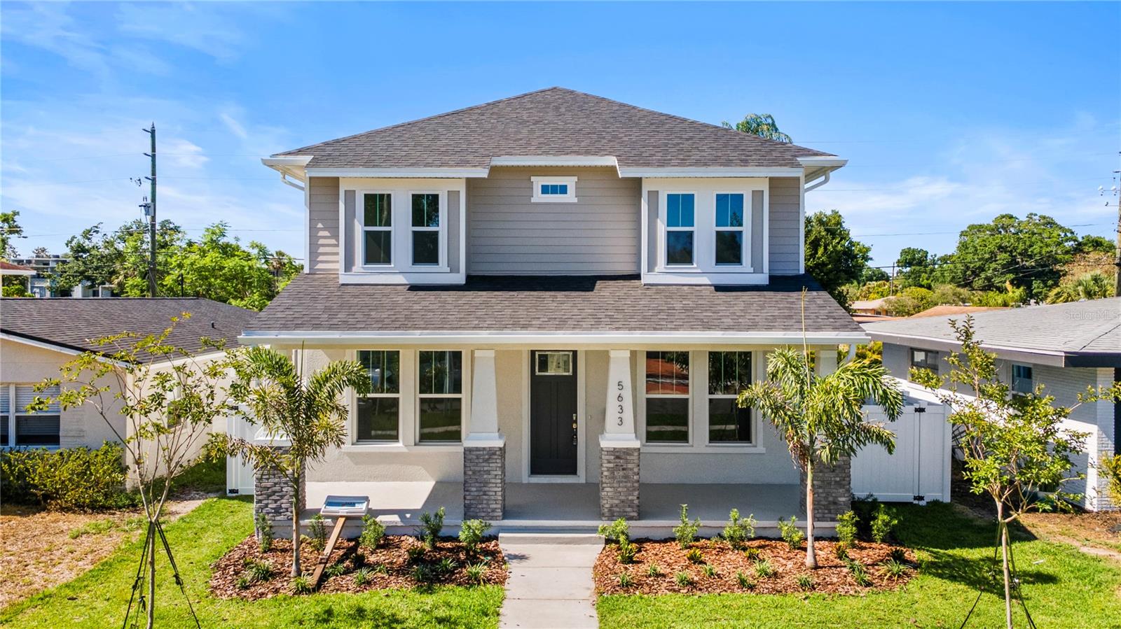 NEW CONSTRUCTION - AVAILABLE NOW UNMATCHED VALUE - BUILDER INCENTIVES AVAILABLE - Flood-resistant, elevated home featuring IMPACT WINDOWS, and 50-AMP GENERATOR INLET - Schedule a tour today!This stunning 5-bedroom, 3-bathroom, two-story craftsman comes with endless luxurious upgrades blended with coastal living. Enjoy entertainment and hosting dinners in the gourmet kitchen with a separate dining space. Whether it’s luxury vinyl plank flooring throughout the entire home, and upgraded tile in wet areas, a first-floor multi-gen suite that can double as an additional guestroom or a den that can function as a formal dining or home office. This home has it all. Enjoy quick access to Florida’s Gulf Coast beaches, including Treasure Island, as well as top-tier amenities such as Pasadena Golf & Yacht Club, a dynamic dining scene with popular restaurants, Whole Foods Market, and Publix Shopping Center, ensuring everything you need is at your fingertips.Whether you're enjoying a morning walk along the waterfront, discovering downtown’s cultural gems, or unwinding on the nearby gorgeous Gulf Coast beaches, this home places you at the center of it all.**Builder Incentives and closing costs available **