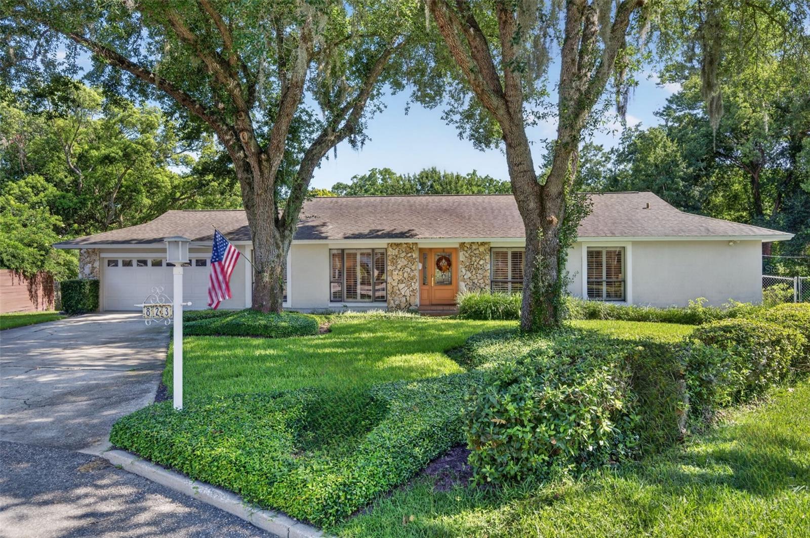 Outstanding Dommerich Woods location on .28 acre lot with serene views of the nature preserve! This immaculate home offers the perfect blend of comfort, style and privacy.  Tucked away on a charming tree-lined cul-de-sac, 823 Woods Court welcomes you with exceptional curb appeal.  Step inside to a spacious foyer introducing gleaming wood floors, elegant crown molding, and an abundance of natural light. The versatile floor plan offers several inviting living spaces!  At the front of the home, the formal living & dining rooms flow seamlessly into the beautifully updated kitchen, complete with a cozy breakfast nook, new cabinetry, quartz countertops, stainless steel appliances and an oversized breakfast bar overlooking bright family room.  French doors open to the spectacular 28x11 sunroom with vaulted ceilings and a stunning wall of windows, providing breathtaking views of the manicured backyard, two private patios and the tranquil nature preserve- creating a peaceful retreat you'll enjoy year-round.  The spacious primary suite features two closets and a generously sized en-suite bath with dual vanities and built-in storage.  Two additional guest bedrooms and a large guest bathroom with built-in closets provide plenty of space for family and visitors.  Additional updates and features include fresh interior paint, an inside laundry room, a two-car garage with new garage door, a new Trane HVAC system. new water heater. irrigation system with new well pump, Roof 2018 & NO HOA! Excellent schools: Dommerich Elementary, Maitland Middle & Winter Park High!  Residents enjoy access to the Dommerich boat ramp on Lake Minnehaha/Chain of Lakes, as well as a short stroll to the newly refurbished boardwalk leading to Maitland Community Park.  This move-in ready home combines an exceptional location, thoughtful updates, and picturesque surroundings ...WELCOME HOME!