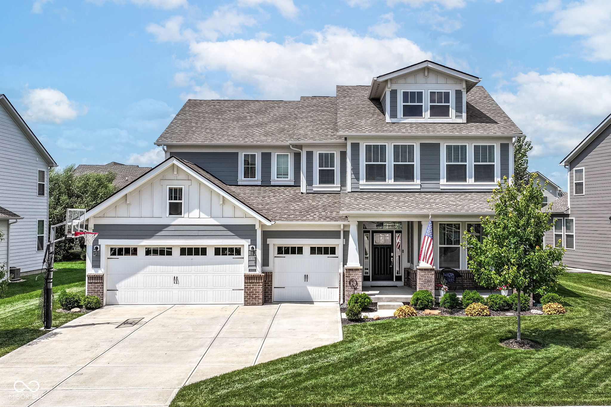 Beautiful 5BR/3.5BA Home in Popular Vermillion of Fishers! Spacious 2-story home offers perfect blend of style, comfort, & functionality. Step inside from the charming covered front porch to find brand new LVP flooring throughout the main-lvl. French doors open to private Den/Library, while the Great Rm features cozy gas-log fireplace. Kitchen is a chef's dream w/ Quartz c-tops, SS appliances (including brand-new dishwasher), center island w/ breakfast bar, walk-in pantry w/ custom shelving, & adjacent Sitting Rm, Breakfast Rm, & Office Nook.  Upstairs, you'll find a versatile Loft, luxurious Primary Suite w/ tray ceiling, double vanities, fully tiled shower, & walk-in closet, plus 3 additional BRs, full bath w/ double sinks, & conveniently located Laundry Rm. Finished Basement includes large Rec/Play Rm, BR 5 w/ egress window, full bathroom, & storage rm. Enjoy outdoor living on the covered patio w/ ceiling fan overlooking fully fenced backyard. Neighborhood amenities include community pool, park, basketball court, & soccer field. Located in highly sought-after HSE Schools. Move-in ready and waiting to welcome you home!