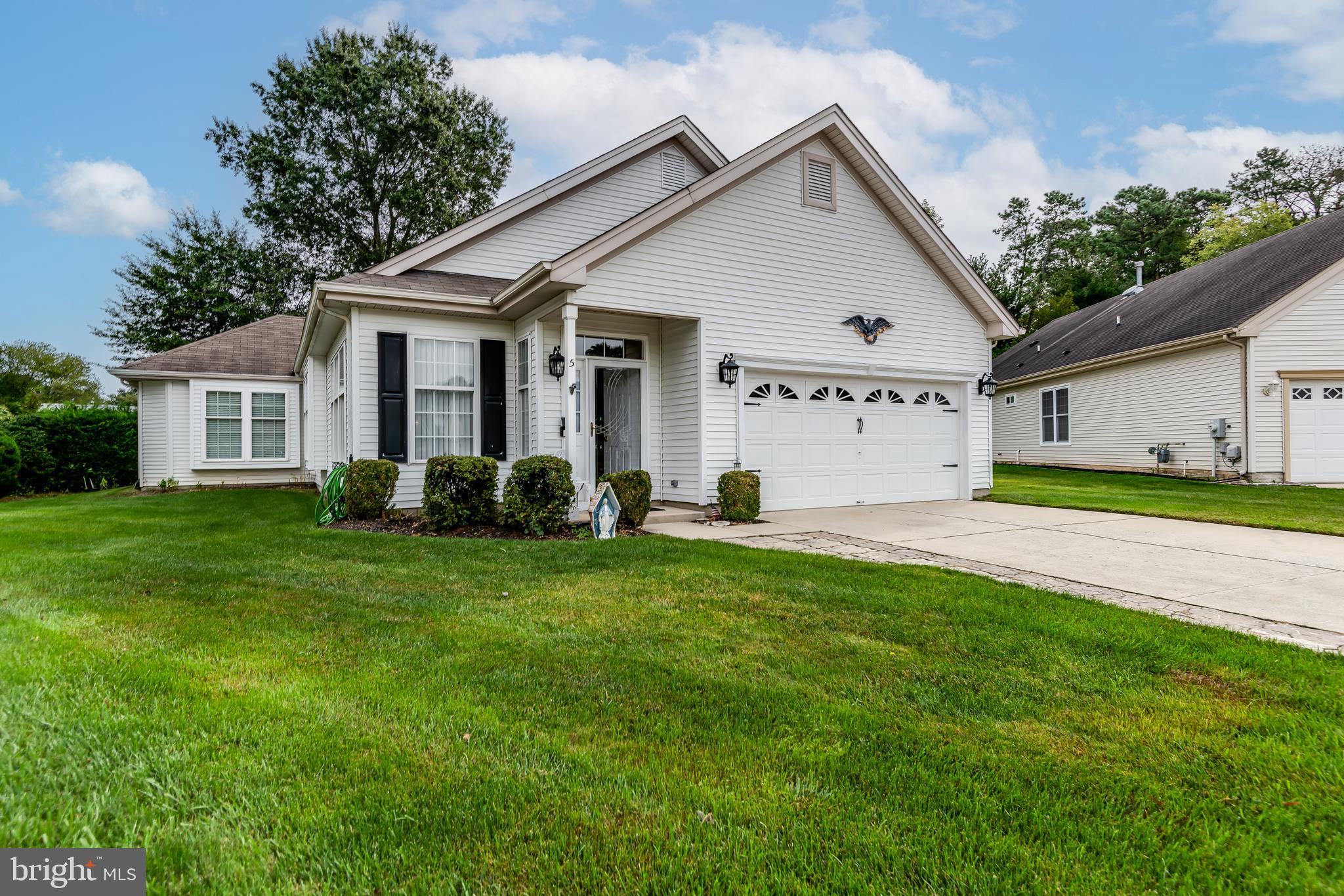 Exclusivity is in the address! Highly desirable Dutchess Court Gas Home boasts more than 2000 Sq. Ft. of Stately Living. Pristine in all ways, this impeccably maintained and cared for home will be your Place of Pride. Nestled on a quiet Cul-de-sac, this Expanded Kingswood Model offers a Welcoming Entrance into a Formal Living and Dining Room Open Concept. You will be immediately taken with the Gleaming Laminate Flooring that runs Through to the Kitchen and Hall Areas. Speaking of Kitchen…you won’t get any nicer than this thought-out Layout! Before you are Shining Oak Cabinets, Corian Countertops, Bespoke Tile Backsplash and Stainless Steel Appliances and Complimenting Fixtures complete the look. An Island tops it off! The kitchen also has a Dining Area that Opens up to the Addition that’s absolutely perfect for Entertaining or Intimate Gatherings! There is also a Gas Fireplace with Handcrafted Gorgeous Mantel, Hearth and Accent Trim. What a Perfect Place to watch the Snow Fall with a Turkey in the Oven!! A door from the Kitchen leads out to a Perfect Patio with Retractable Awning. Back inside, we follow the Gleaming Floors to a Second Bedroom which is fabulous for Guest, an Office, Exercise or Craft Room. This Room is Bright and Airy and offers plenty of closet space! An Impeccable Main Bathroom for Guess features a Oak Vanity, Tub Shower and Transom Window allow for light and air. Finally, we come to a Fabulous Primary Bathroom Suite. Expansive and Generously Sized, you have Two Walk-in Closets, A Wall of Windows with a Large Window Sill through which you can see and observe Nature. A Dedicated Bathroom with Stall Shower, Oak Vanity Complete this Room….BUT WAIT….the Best is Awaiting…How about a Personal Sunroom? Attached to this Primary Bedroom is your very own Oasis to Watch TV, Relax with a Good Book or Travel the World on a Spin Cycle! You can choose to share if you want to!For Energy Savings and added comfort Leased Solar Panels are a valuable addition. For your Convenience is a Laundry Room that Leads to a Coveted Two-car Garage!!So much to Love about this One-of-a-Kind Home!! If there was ever a Home that Offers Value for Money, this is it!