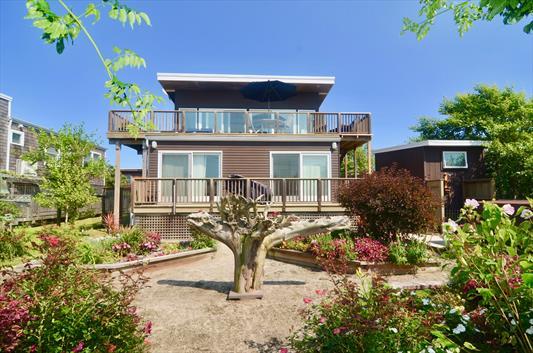 This is Your Chance to Rent a Beautiful 4 Bedroom, 3.5 Bath House on Fire Island at a Reduced Rent Price! Enjoy the Beautiful Summer Weather we are Finally Having and Enjoy a Home in the Summer Club Subdivision of Fire Island with a Clubhouse with a Gym, a Play Area, New Tennis Courts and a Beautiful Beach and Within Walking Distance to Ocean Beach. Top Floor Has Great Room with Newly Remodeled Eat-in-Kitchen, Dining Room, Living Room and Half Bath. Ground Floor Level has Primary Bedroom with Primary Bath which Leads Out to Outdoor Shower, 2nd Bedroom with Full Bath, 3rd/ 4th Bedroom with Room for 5-6 and 3rd Full Bath. Private Location Backing Up to the Fire Island National Seashore with Gorgeous Views of the Bay, Ocean and Gardens. 2nd Floor Outdoor Deck and Ground Floor Deck with Hot Tub. Rent Includes All Utilities and is $6,500/Week. Available from July 14th to August 8th or any Combination of These Dates.