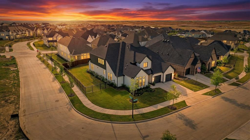 Skip the build timeline and settle in this practically new home before the next school year begins. This 2025-built Toll Brothers home offers the rare opportunity to step into a fully upgraded, move-in ready home just in time for summer.Situated on a prominent corner lot, the exterior offers a clean introduction, but inside, the home opens up with impressive scale. Vaulted ceilings, white oak floors, and expansive living spaces create a layout that feels significantly larger than expected and designed for real everyday living.The kitchen is both functional and elevated, featuring a large island, abundant cabinetry, a spacious walk-in pantry, and a separate butler’s pantry that makes hosting and daily routines seamless.Designed with a growing household in mind, the main level includes a dedicated office, a private primary suite, and a guest suite ideal for extended stays or long-term flexibility. A tucked-away under-stair space adds a fun bonus for storage or a creative play area.The living room is anchored by a floor-to-ceiling fireplace, creating a central gathering space that feels both open and inviting.Upstairs, two additional bedrooms share a Jack and Jill bath, along with a large game room and dedicated media room, offering plenty of room to spread out, relax, and entertain.Out back, the covered patio is perfect for winding down in the evenings, while the oversized yard offers space to add a pool, playset, or create your own outdoor retreat.Don't forget the sizeable 3 car garage- it's a must have!With on-trend finishes, a thoughtful layout, and builder warranty still in place, this home is ready now. Move in, get settled, and start the next chapter without missing a beat.Walsh residents enjoy resort-style amenities including pools, fitness center, trails, parks, and community events, with HOA services covering high-speed internet, front yard maintenance, and full access to all amenities.