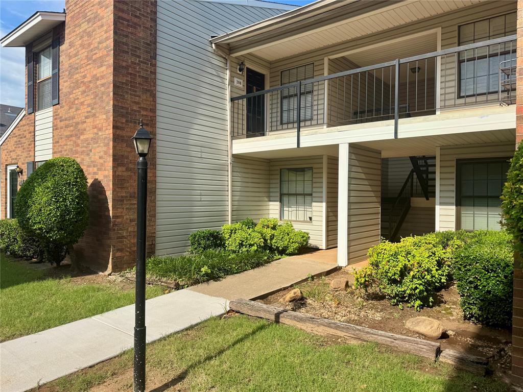This well-maintained 2-bedroom, 2-bathroom condominium is located directly across from the University of Oklahoma. Whether you’re a student, faculty member, investor, or just looking for a great buy, this property offers unbeatable access to campus and Norman amenities. There are laminate wood floors throughout the living areas, vaulted ceilings, abundant natural light, and a wood-burning fireplace. The kitchen comes fully equipped with a NEW smooth-top stove, refrigerator, microwave, and dishwasher. The dining area opens to a private balcony. The primary suite offers a large walk-in closet and private bathroom, while the second bedroom also enjoys direct access to a large secondary bathroom featuring a stacked washer and dryer that stays with the condo. NEW carpet in the bedrooms. Additional features include one dedicated covered parking space and one open-air space. The HOA covers exterior maintenance, insurance, and access to a community pool. New roofs, siding, fence and balcony work scheduled to be done soon, giving the property a fresh, updated appeal. Call today for a private showing!