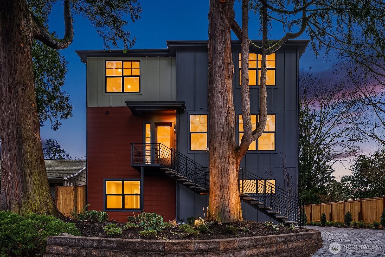 Experience unparalleled attention to detail in this stunning new luxury home by engineering-led Pascal Homes, nestled in the desirable Wedgwood neighborhood. As you approach, be captivated by the striking floating staircase and grand entryway. Step into an open living layout that seamlessly blends daily comfort with entertaining ease. The chef’s dream kitchen features a massive quartz waterfall island and top-of-the-line Miele appliances. The hidden panel appliances and stylish Spanish tile add a touch of sophistication, while designer lighting creates a warm and inviting atmosphere. The enormous covered deck off the dining is perfect for year-round entertaining. Walk up the custom white oak wood banister staircase to the third floor complete with a luxurious primary suite, 2 additional bedrooms, bath and laundry room. Bathrooms throughout, are appointed with premium Grohe & Toto fixtures. Highlights of the primary include a spacious walk-in closet and a spa-like five-piece bath, complete with an outdoor deck for a private retreat. The lower level offers functional versatility with an ADU or recreation zone and an ensuite bedroom. An office, another laundry, half bath and spacious 2 car garage complete the home. Situated on an ideal residential street, walking distance to Wedgwood Elementary, you’ll enjoy the peace of neighborhood living while being close to all the local amenities Northeast Seattle has to offer.