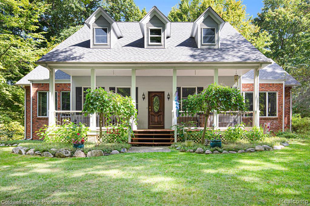 Welcome home to 5511 Blood Rd!
Backed by the scenic Metamora Hunt Club, this estate combines timeless country charm with modern comfort. Set on a private, wooded 10-acre lot along a certified Natural Beauty Road that is county maintained, the property offers the perfect balance of space, serenity, and opportunity.
The floor plan is thoughtfully designed, featuring a spacious main-level primary suite for convenience and privacy, complemented by three generously sized bedrooms upstairs—ideal for family, guests, or versatile living arrangements. Soaring ceilings and wood cabinetry highlight the quality craftsmanship, while the open layout creates a warm, inviting flow for both everyday living and entertaining.
The walk-out lower level is designed with entertaining in mind, offering a full bar and wine cellar, along with direct access to the property’s natural surroundings. Outdoor living is equally appealing, with a welcoming front porch and expansive back deck overlooking your wooded sanctuary.
Recent updates, including a new roof in 2024, ensure peace of mind. While the home has been lovingly cared for and is move-in ready, it also offers the opportunity for thoughtful updates to reflect your personal style and unlock additional value.
With its combination of size, setting, and quality, this property represents a rare chance to own a well-built estate in one of the area’s most desirable locations.