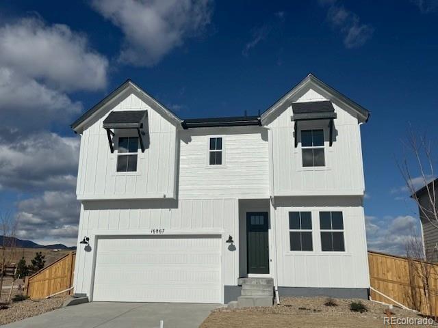What's Special: Larger Lot | No Rear Neighbors | Flex Room | Loft | 2-Story Great Room with Fireplace, New Construction - Ready Now! Built by America's Most Trusted Home Builder. Welcome to the Ridgway at 16867 W 92nd Drive in Trailstone Town Collection! This beautiful home blends thoughtful design with comfortable living, centered around a spacious kitchen that overlooks the dining area and features an eat-in island and generous walk-in pantry. A flexible front room offers space for a study, playroom, or creative retreat. The great room feels open and airy with its volume ceilings, creating a welcoming place to gather. Upstairs, the private primary suite is joined by a spacious loft and two well-appointed secondary bedrooms, offering both connection and privacy. A large laundry room and two-car garage complete this charming layout. Discover Trailstone, a new home community on the edge of the Rocky Mountains in Arvada, CO. Just off Candelas Parkway and only 15 miles from Boulder, find room to roam in stunning single-family homes with spacious backyards in Arvada. You'll love the incredible views of Downtown Denver, the Rocky Mountains and Standley Lake. With incredible planned amenities including an outdoor pool and pickleball courts, every day is an opportunity to explore a new path at Trailstone. Additional Highlights Include: 8'x12' center meet sliding glass doors, covered patio, 8' doors on main level and modern fireplace. Interior photos are for representative purposes only. MLS#8456602