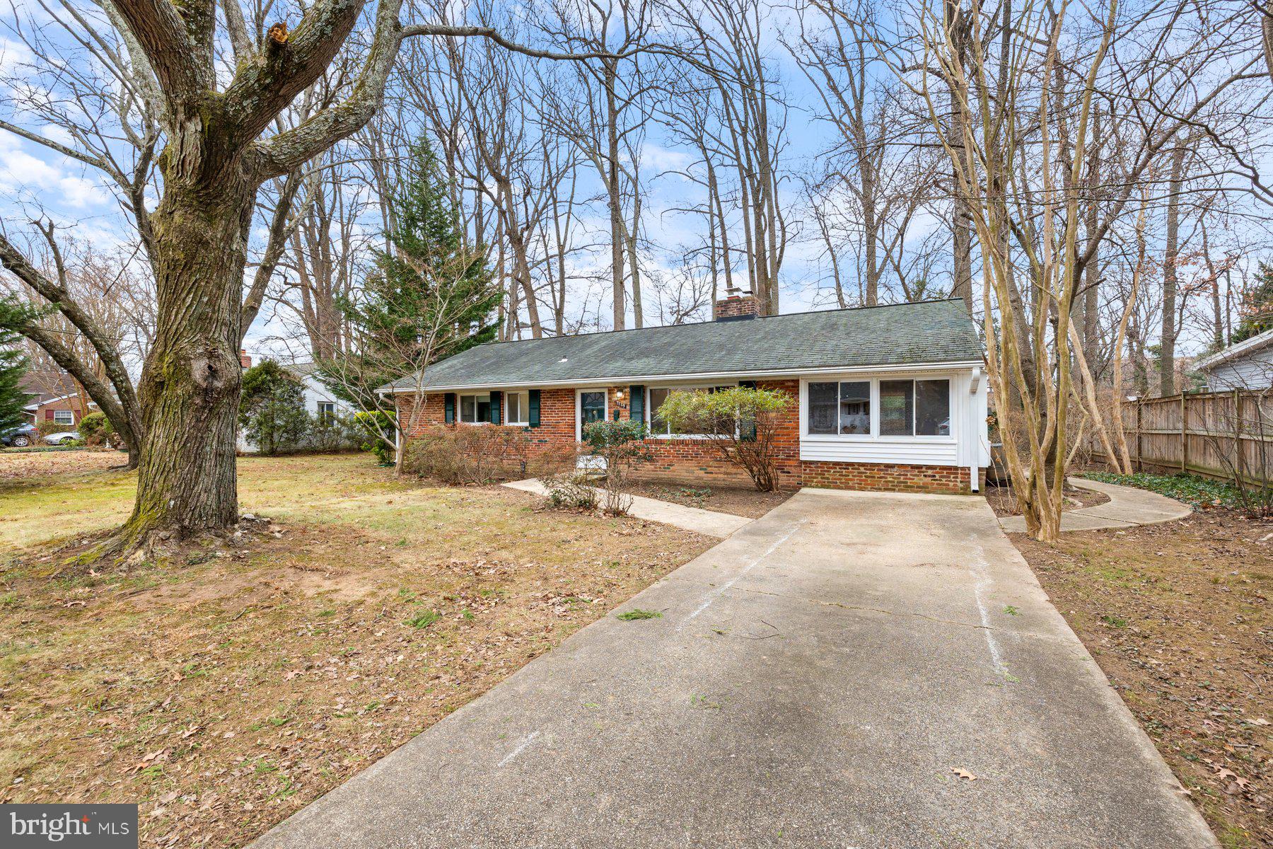 Opportunity knocks in Springfield! This three-bedroom, one-bath home offers a fantastic chance for buyers looking to personalize a property and add value. Tucked away on a quiet street in a sought-after neighborhood, the home delivers privacy, potential, and a prime location.Inside, you’re welcomed by a spacious family room featuring hardwood floors and a cozy wood-burning fireplace, perfect for chilly evenings. A partially open layout connects the dining area and kitchen, creating an easy flow. The kitchen offers serene views of the backyard, while an additional living space just off the kitchen provides flexibility for entertaining, a home office, or a casual living space. A separate room dedicated to a washer and dryer adds every day convenience and functional space.A sliding door from the dining area opens to a flat, tree-lined backyard ideal for entertaining, play, or simply relaxing outdoors. Hardwood floors run throughout the home, and three bedrooms along with a full bathroom complete the interior layout.Situated on a generous 0.25 acre lot, the outdoor space offers mature trees that provide natural shade and a cooler, more private setting with room to garden, play, or expand your outdoor living vision. The exterior offers great curb appeal with a shaded front yard framed by mature trees and a wide, extended driveway providing ample parking. The location truly shines just minutes off I-495 and Braddock Road, with an easy commute to Washington, D.C., and close to shopping centers, grocery stores, and tons of great restaurants.  The home feeds into highly ranked schools including North Springfield Elementary School, Holmes Middle School, and Annandale High School. This is a great chance to renovate and create your dream home in a wonderful neighborhood. Quick closing is preferred.  Some photos are virtually staged.  Book your appointment today!