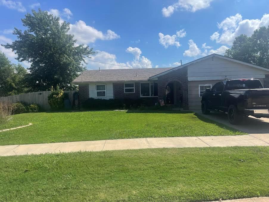 Cozy corner lot 3 bed / 1.5 bath 1400 sq ft mol home is close to the Airport, I35, I240 and I44. Garage has been converted into an extra room with assess to the outside, Livingroom and kitchen.  The fenced backyard has a shed, raised bed and a storm shelter. Appliances can stay with the home.