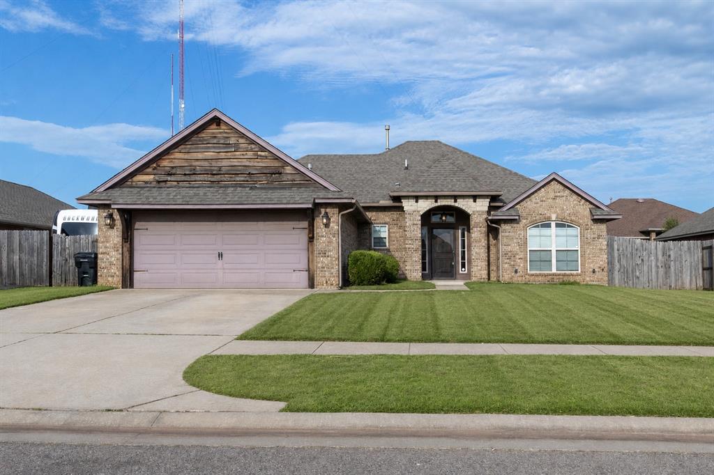 Welcome to this well kept 3-bedroom, 2-bathroom Modern Craftsman home offering the perfect combination of style, comfort, and convenience. With its attractive brick and stone exterior, decorative wood accents, and inviting covered front porch, this home makes a lasting first impression.Step inside to an open-concept floor plan featuring tall ceilings, abundant natural light, and a spacious living area that flows effortlessly into the kitchen and dining space which is perfect for entertaining or everyday living. The kitchen offers generous cabinet and countertop space, modern finishes, and a large island that serves as the heart of the home.The private primary suite is thoughtfully separated from the secondary bedrooms and features a spacious bedroom, an ensuite bathroom with dual vanities, a soaking tub, separate shower, and a large walk-in closet. Two additional bedrooms provide plenty of space for guests, or a home office.Enjoy relaxing or entertaining in the fully fenced backyard with room for pets, play, or outdoor gatherings.Conveniently located just minutes from I-35, shopping, restaurants, parks, and highly regarded Moore schools, this home offers easy access to both Oklahoma City and Norman while keeping you close to everyday amenities.Don't miss your opportunity to own this move-in-ready home, schedule your private showing today!