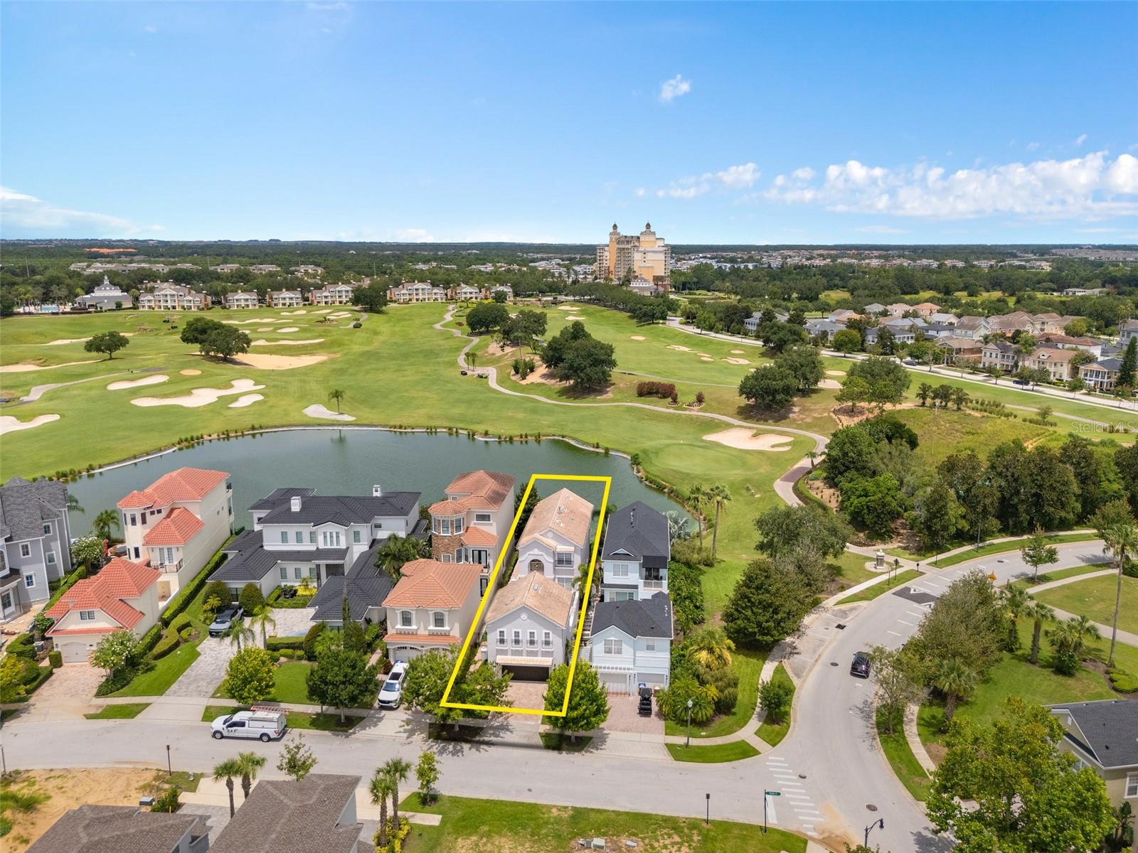 Active Club Membership! Offered fully furnished and turnkey! Positioned along the Arnold Palmer Legacy Golf Course, this 5-bedroom, 4.5-bathroom home offers panoramic water and golf views from multiple vantage points. Located near the center of Reunion Resort, the property provides quick access to the community’s restaurants and signature amenities. At the center of the home is a private courtyard featuring a heated pool, spa, summer kitchen, and outdoor shower. The main entry opens to a two-story foyer that leads to the kitchen, living and dining rooms, a powder room, and one bedroom suite with its own bathroom. Upstairs, the primary suite includes a cathedral ceiling, dual vanity, separate shower, soaking tub, and a private balcony overlooking the golf and water views. A third ensuite bedroom is also upstairs. The detached garage apartment, accessed from the courtyard, includes a kitchenette, two bedrooms, and a shared full bathroom, providing a private retreat. The 2-car garage has been converted into a media and game room, providing an additional 625 square feet of functional living space.Spanning 2,300 acres just 7 miles south of Walt Disney World, Reunion Resort is the only destination in the world featuring 3 signature golf courses designed by Jack Nicklaus, Arnold Palmer and Tom Watson. Reunion is also home to the Leadbetter Golf Academy. Onsite dining options include Eleven, 7593 Chophouse, Traditions, Grande Lobby Sushi Bar, the Clubhouse, the Cove, and Drifters at the waterpark. The water park features a lazy river, slides, outdoor games, and an aquatic playground. The gift shop in the Grande offers sundries and Starbucks coffee. Complimentary shuttles to the Disney transportation and ticket center leave from the Grande daily. Additional amenities include Camp Reunion, the tennis and pickle ball center, bocce ball, miniature golf, foot golf, fitness center, playgrounds, dog park, various community pools including a roof top pool on the 11th floor of the Grande, and more. Zoning for short term rentals allows homeowners to rent their property by the night providing a great opportunity for investors. Reunion also works great as a primary residence or a private vacation retreat. The resort offers three separate 24 hour guard gated entries and one owner/resident only entry.