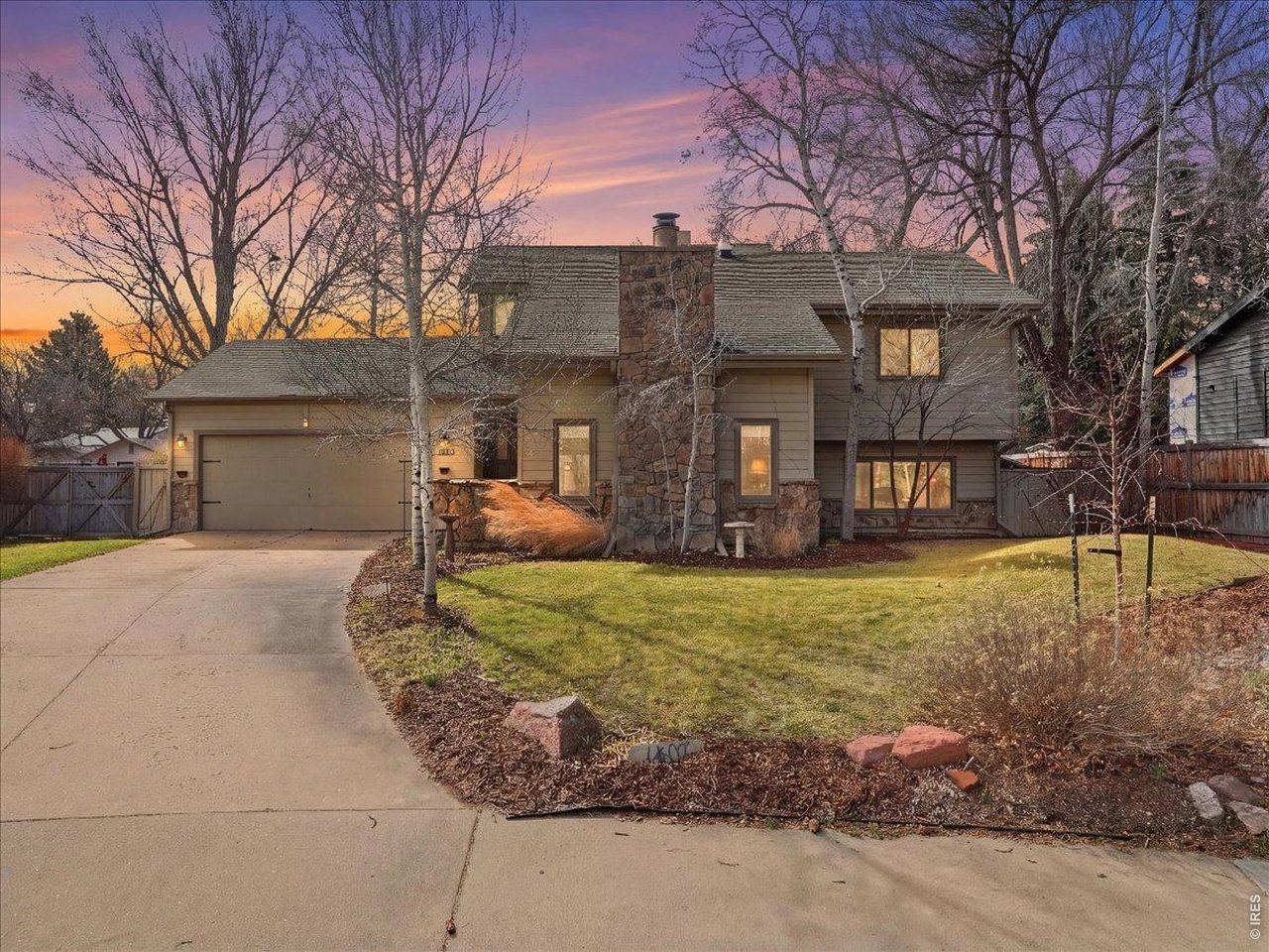 This isn't a cookie-cutter home, and that's precisely why it matters. 1407 Osprey Ct is a thoughtfully crafted property where every room, every detail, and every corner of the lot was designed with intention. Tucked into a quiet cul-de-sac in the established Stonehenge-Parkwood neighborhood, it's the kind of Southeast Fort Collins address that rewards you the moment you step inside.The custom floor plan unfolds with four distinct living areas, each serving a purpose. The two-story vaulted sunroom with wood-burning stove anchors the home with light and views of the private yard. The open kitchen features cabinetry handcrafted by a local artisan - not mass-produced, but made. The sunken living room with stone pellet stove creates genuine warmth and coziness. Downstairs, a garden-level room with generous windows works equally well as a fourth bedroom or dedicated recreation space.The craftsmanship carries throughout: all-wood alder doors with trim made from recycled wood, wrought iron railings, and quality LVP flooring. The primary suite is set apart for privacy. Two additional upper bedrooms share a full bath. Outside, the mature landscaping, expansive patio, xeriscape side garden, and fire pit show a property that's been cared for and designed to live in - not just occupy. A hot tub comes with the listing, ready for immediate enjoyment.Optional HOA membership ($350/year) gives you access to the neighborhood pool and tennis courts, with parks and trails within walking distance. Easy access to CSU, healthcare, and Fort Collins' core employers means this thoughtful home sits in a genuinely livable location.This is the alternative to new construction. This is craft.
